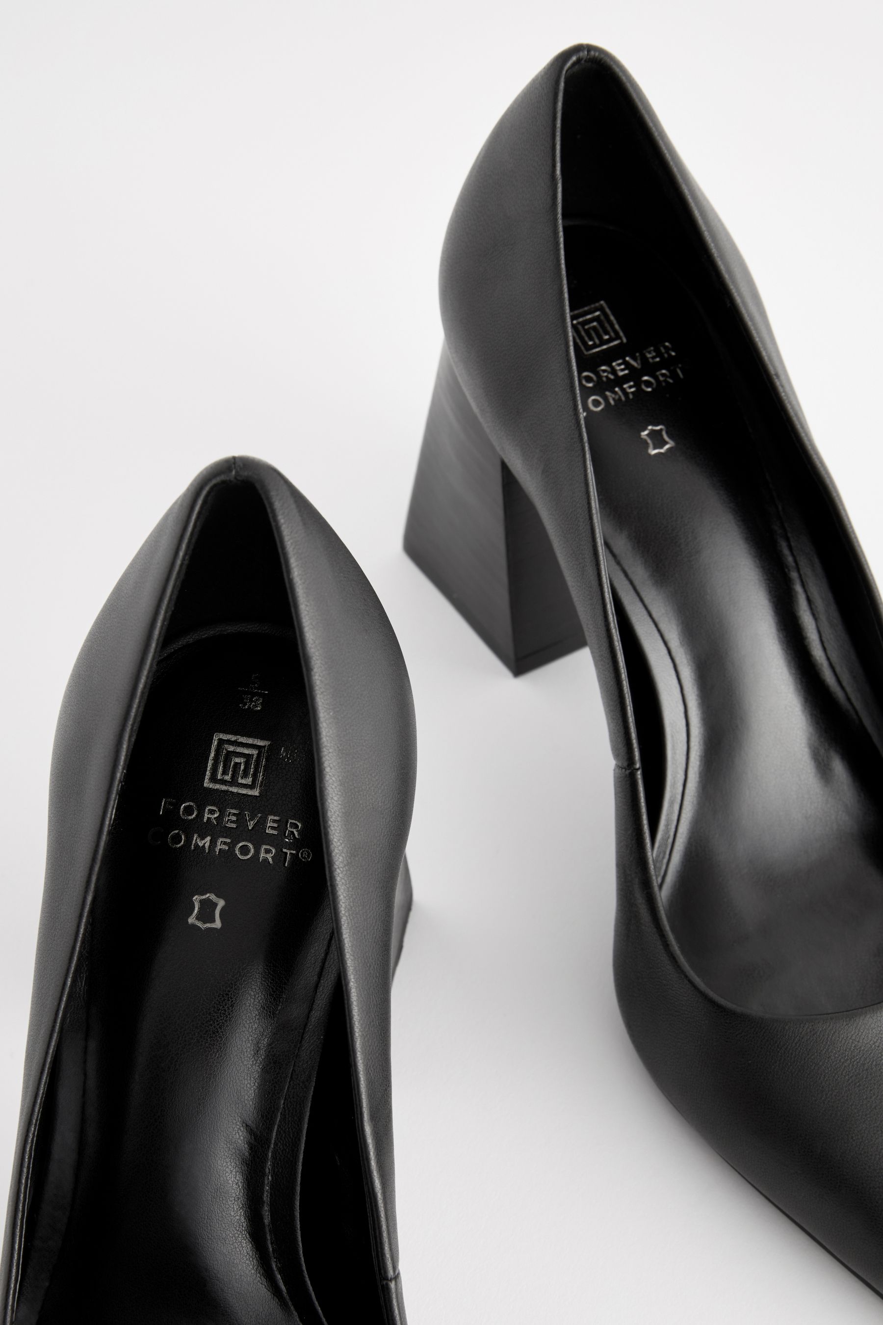 Pointed black block heels 2025