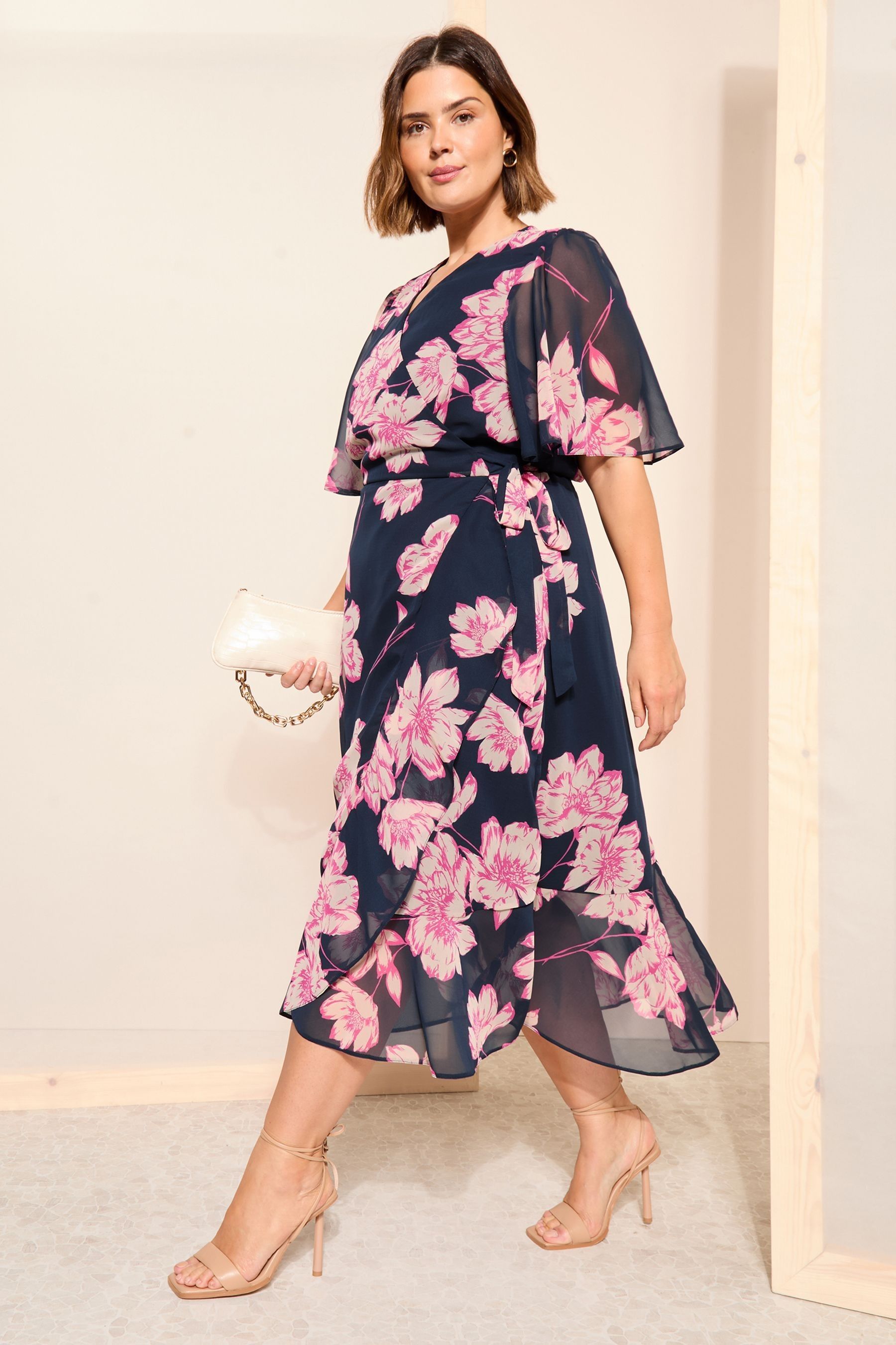 Buy Curves Like These Blue Floral Chiffon Mix Flutter Sleeve Wrap Midi Dress from Next Luxembourg