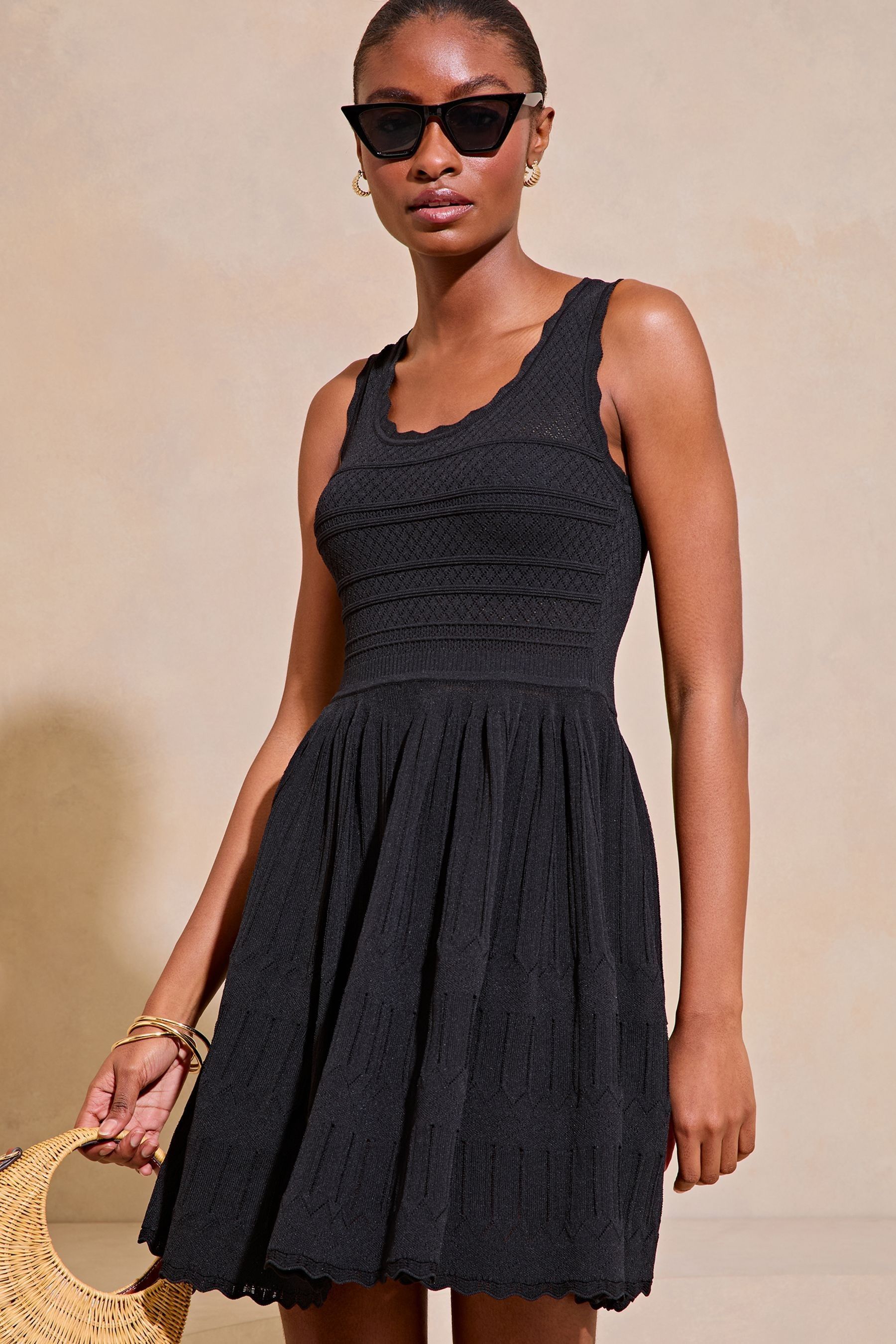 Buy Lipsy Black Knitted Stitch Detail Fit and Flare Mini Dress from the Next UK online shop