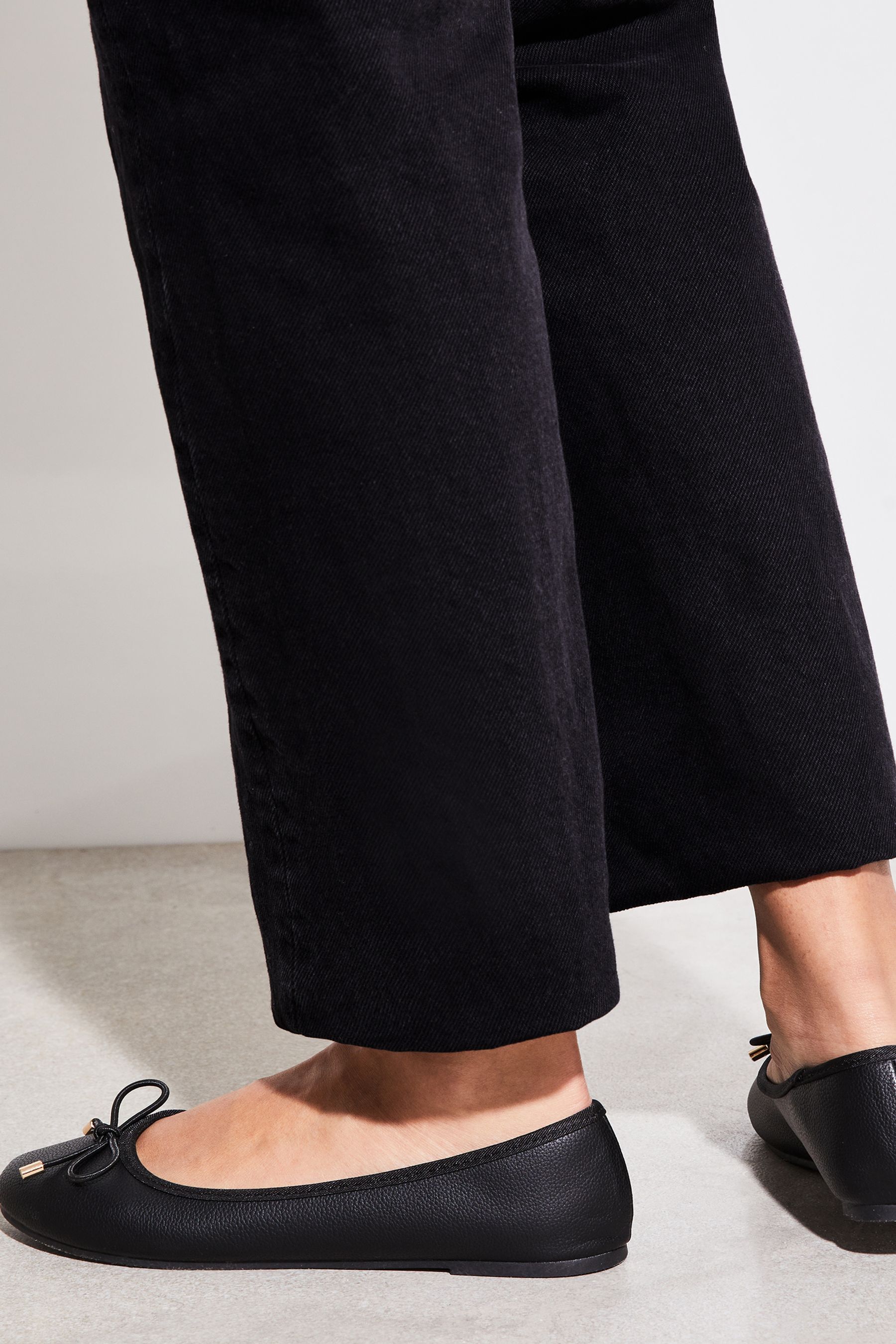 Buy Lipsy Black Wide Fit Metal Bow Faux Leather Ballet Pump from the Next UK online shop