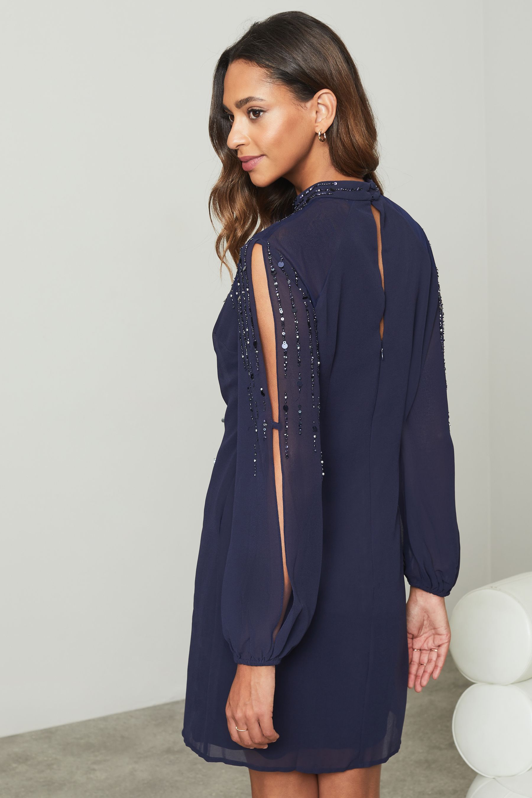 Buy Lipsy Navy Embellished High Neck Sheer Long Sleeve Shift Dress from Next Luxembourg