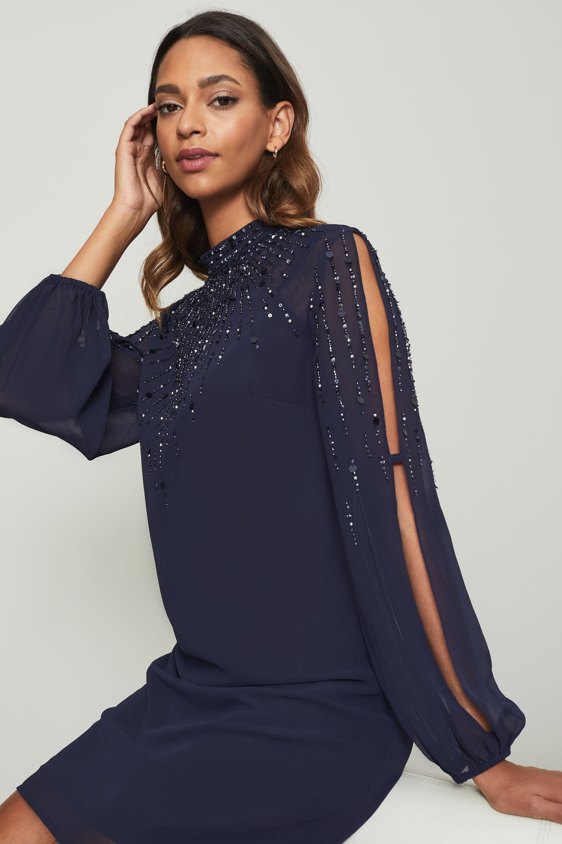 Buy Lipsy Navy Embellished High Neck Sheer Long Sleeve Shift Dress from Next Luxembourg