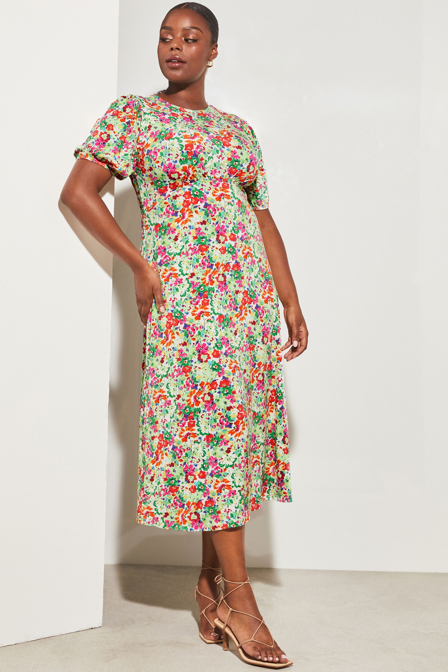 Buy Lipsy Green Ditsy Curve Jersey PUff Short Sleeve Underbust Summer Midi Dress from Next Luxembourg