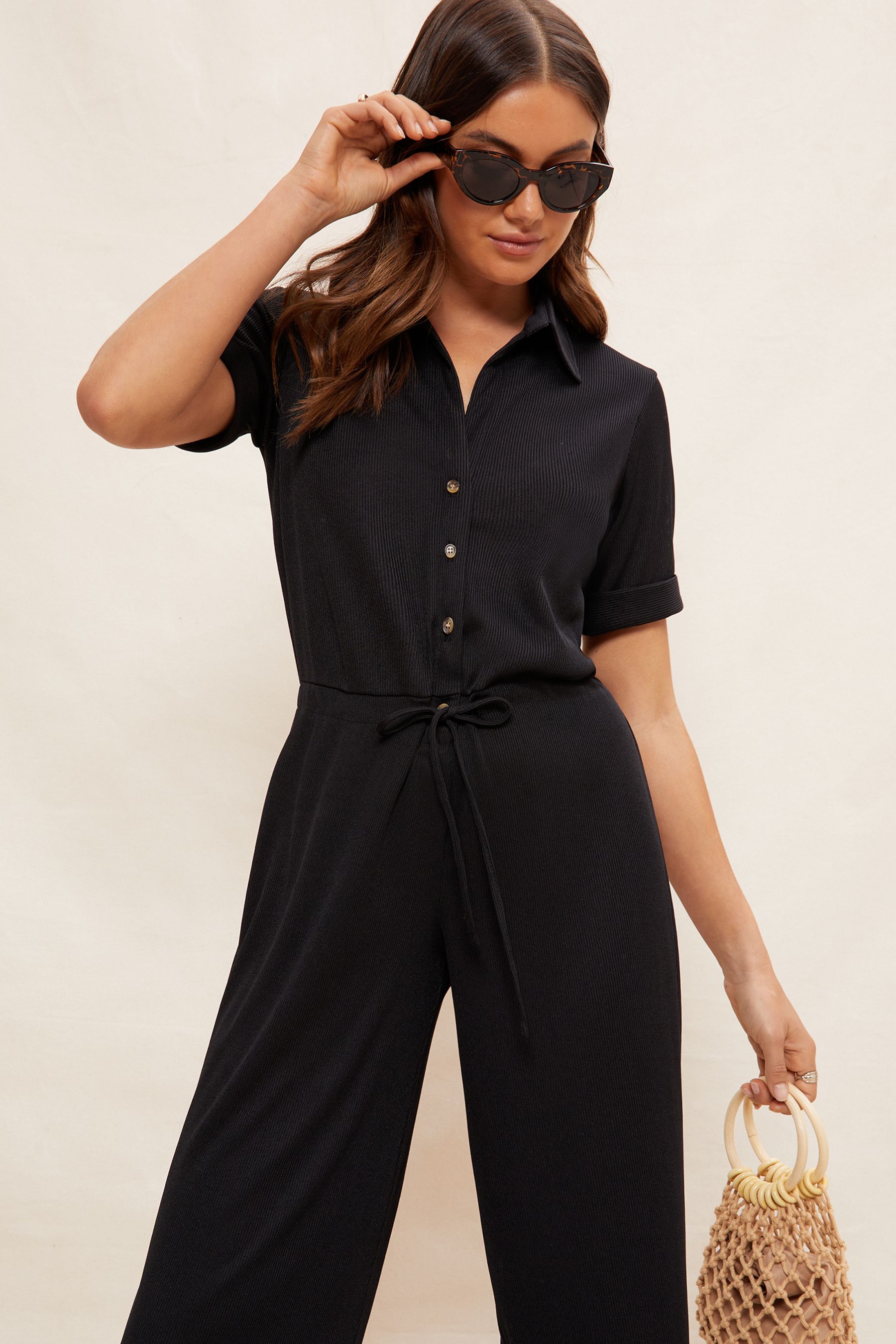 Short sleeve button up jumpsuit discount