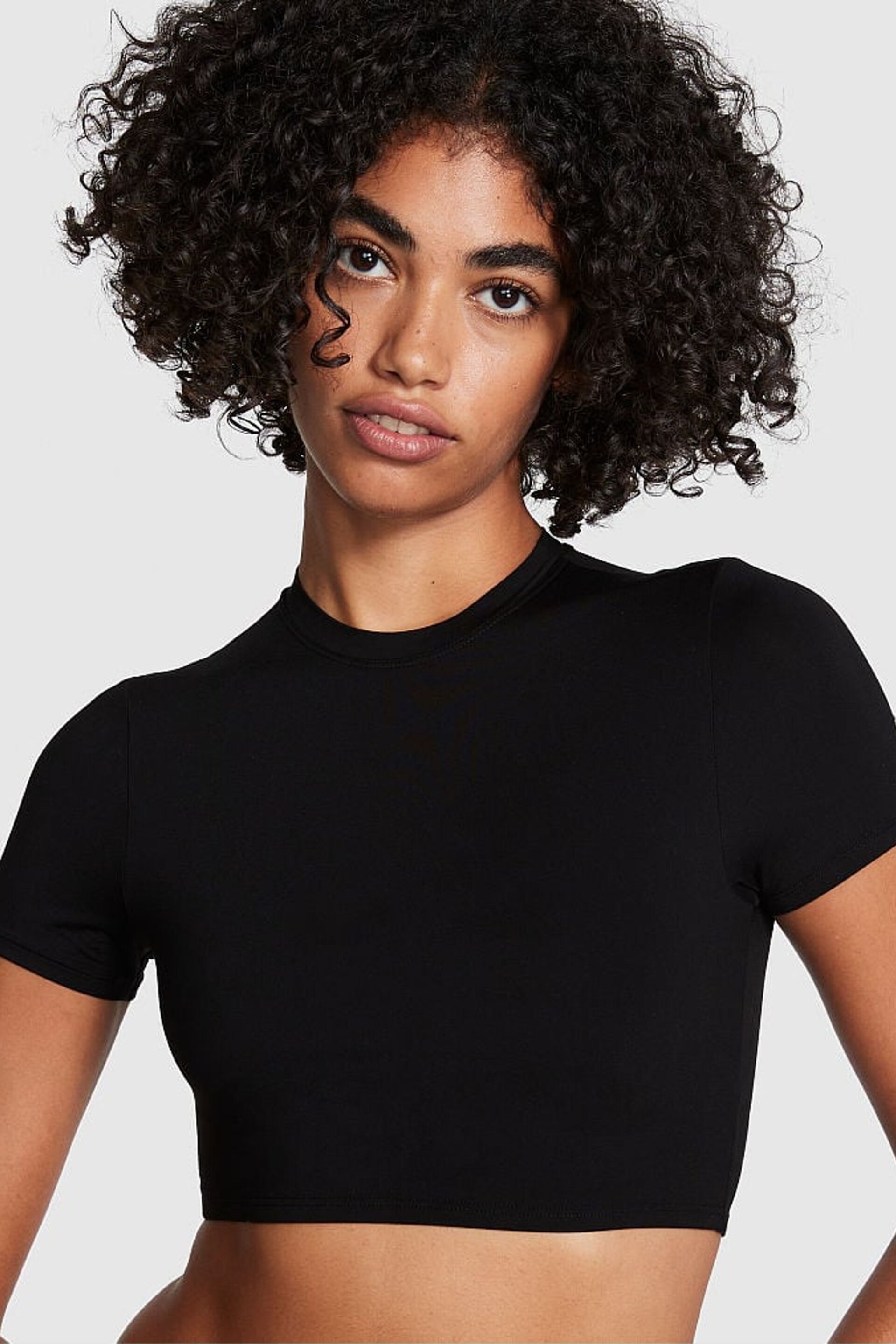 Victoria's Secret PINK Pure Black Soft Stretch Cropped T-Shirt - Image 1 of 4