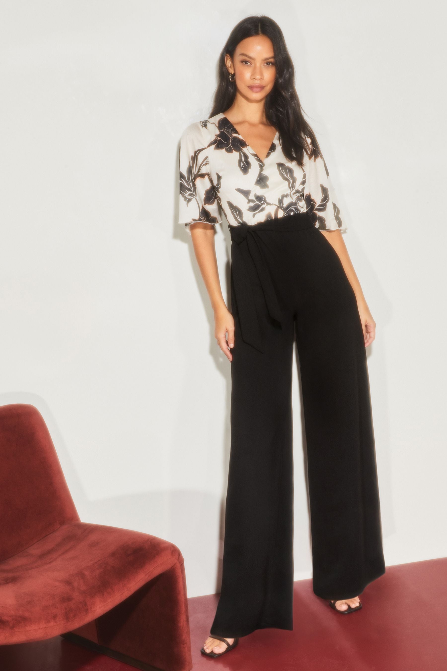 Buy Lipsy Black White Floral 2 in 1 Flutter Sleeve Wide Leg Jumpsuit from Next Luxembourg