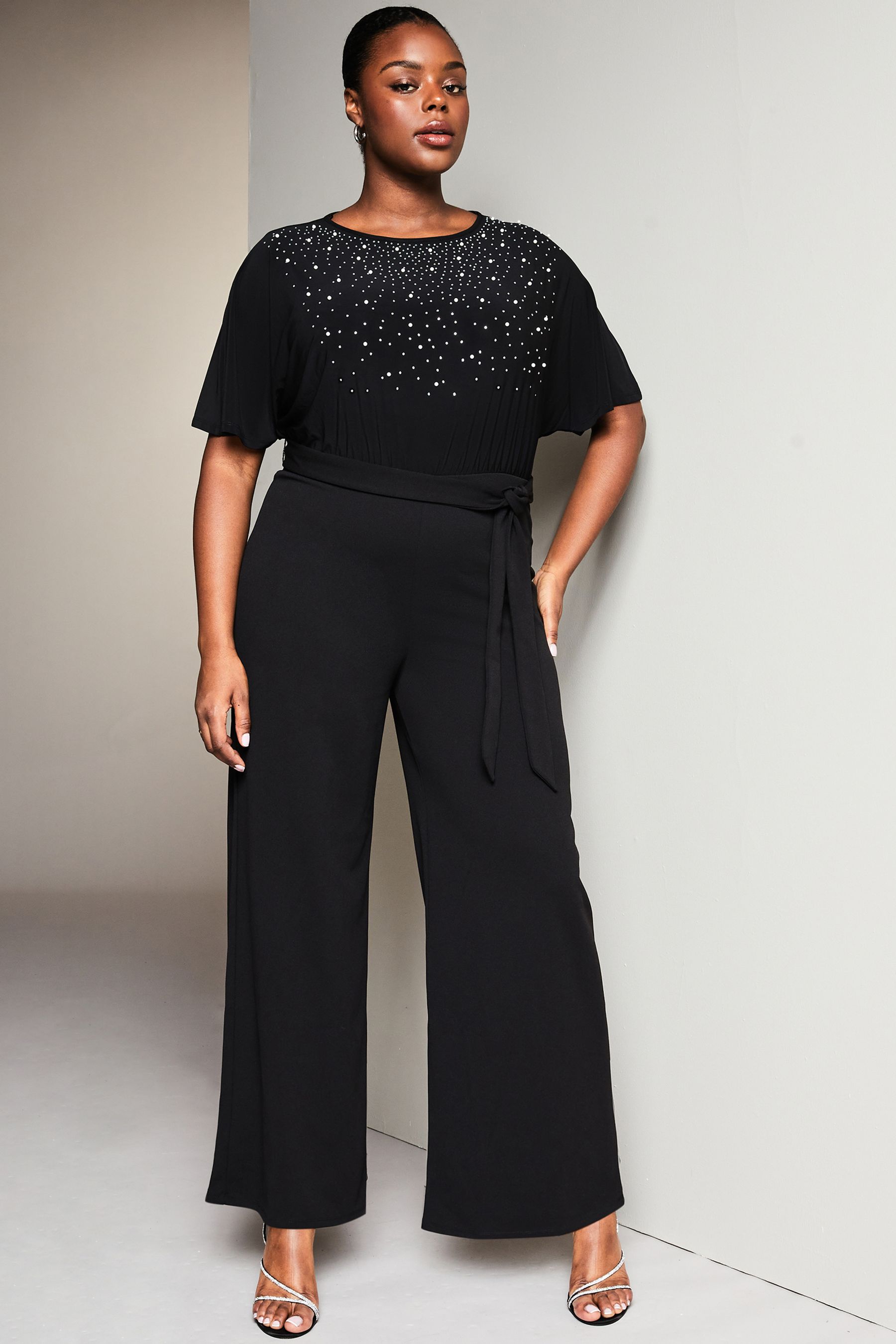Black flutter sleeve jumpsuit clearance