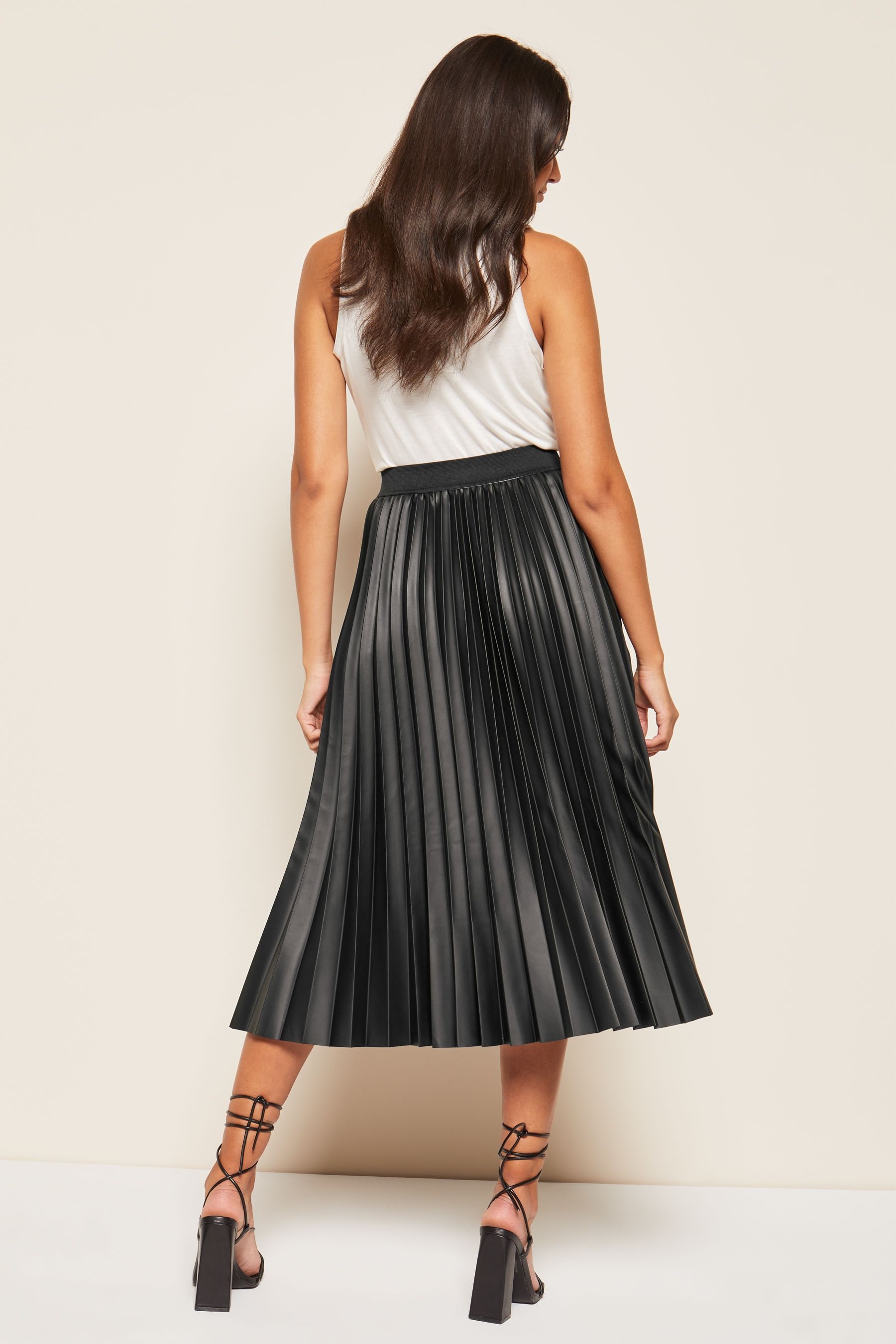 Pleather pleated skirt black top
