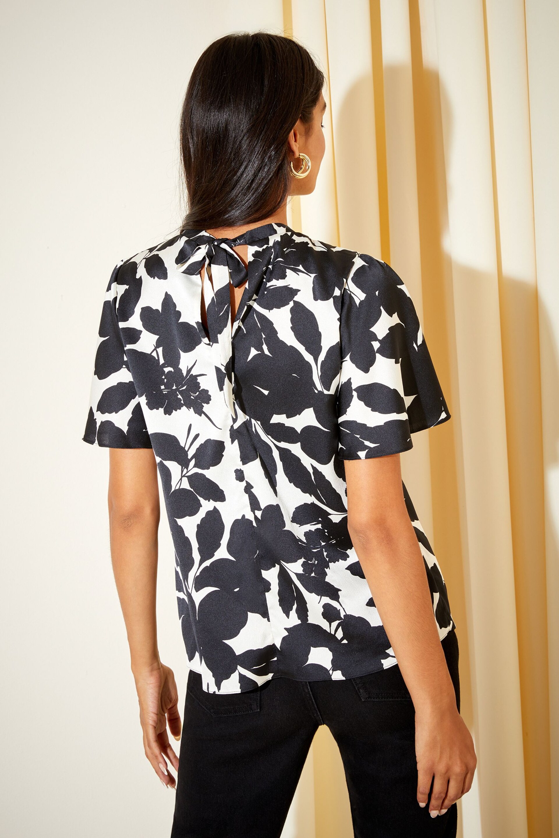 Friends Like These Black/White Printed Flutter Sleeve Keyhole Blouse - Image 4 of 4