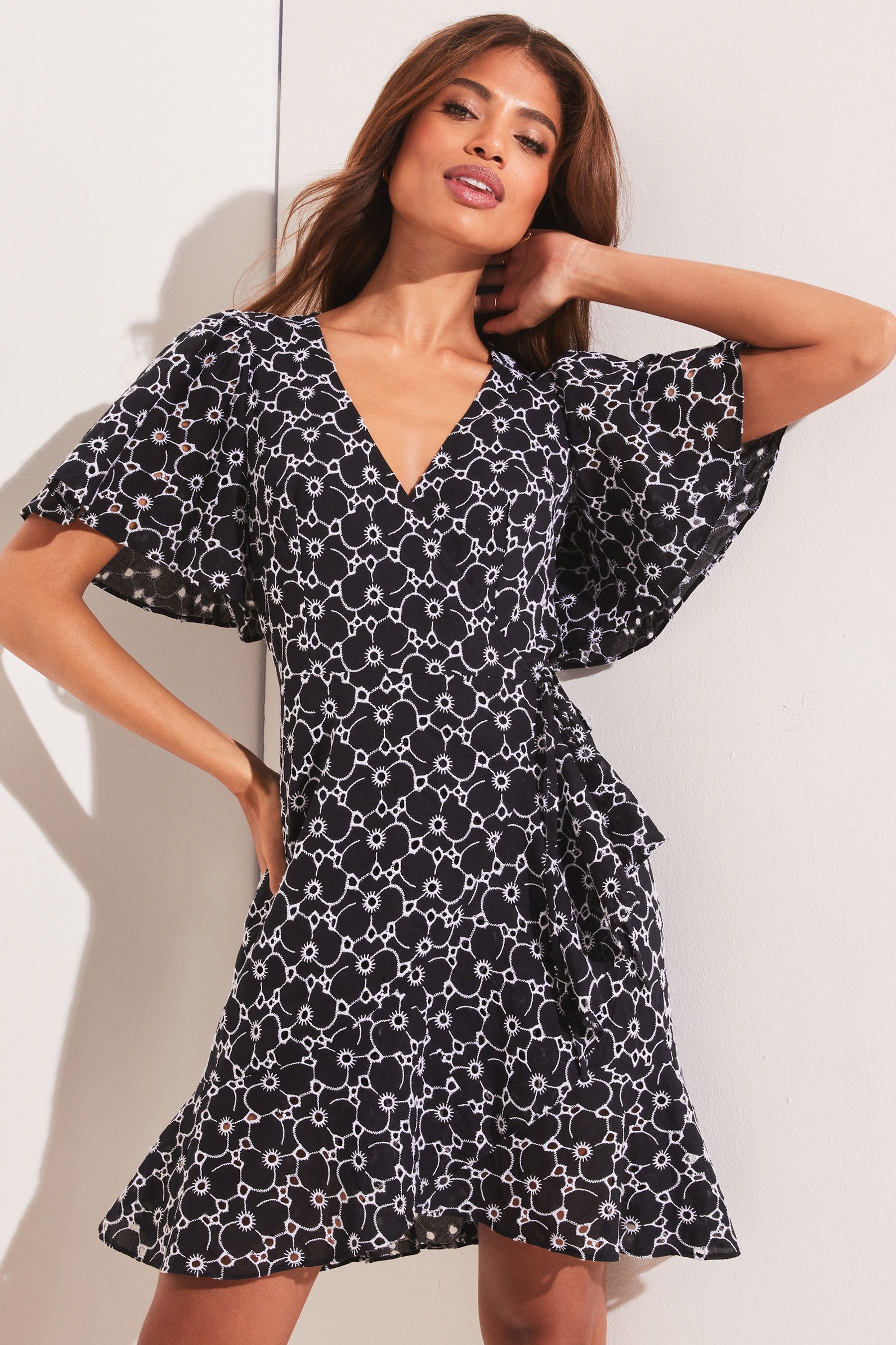 Buy Lipsy Black White Short Sleeve Wrap Mini Dress from Next Luxembourg
