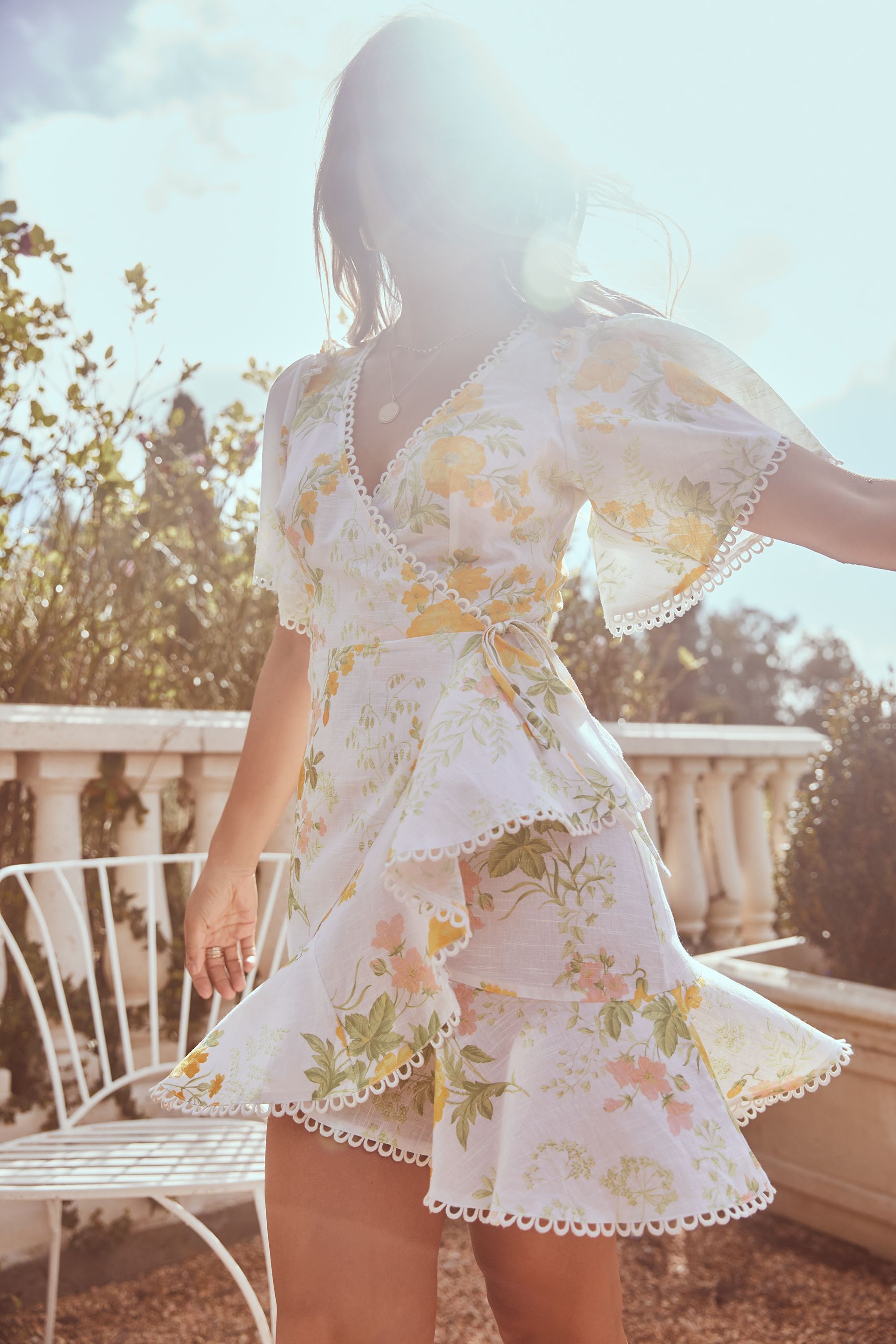 Buy Lipsy Yellow Floral Short Sleeve Wrap Mini Dress from Next Luxembourg