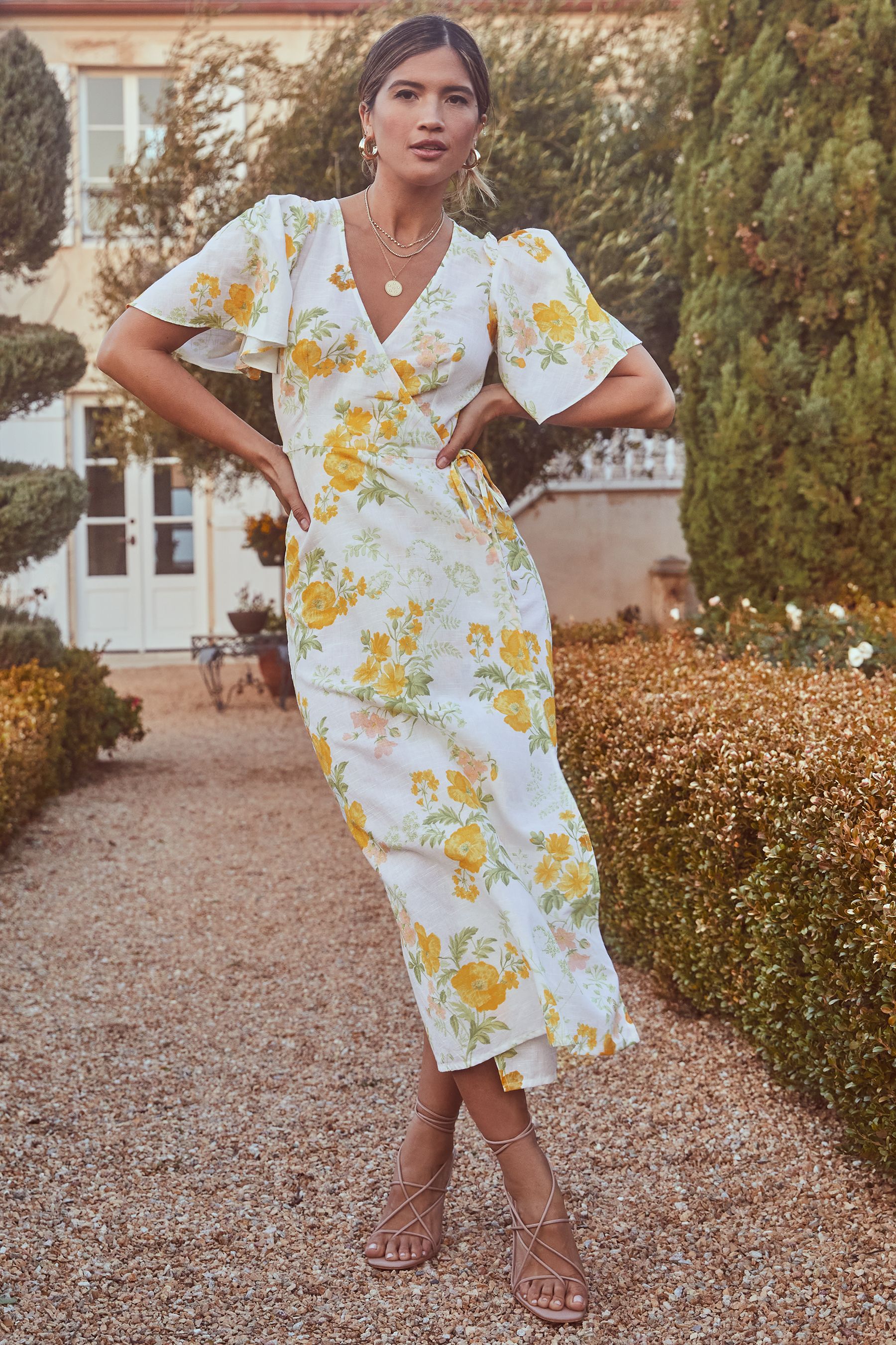 Floral yellow wrap dress store