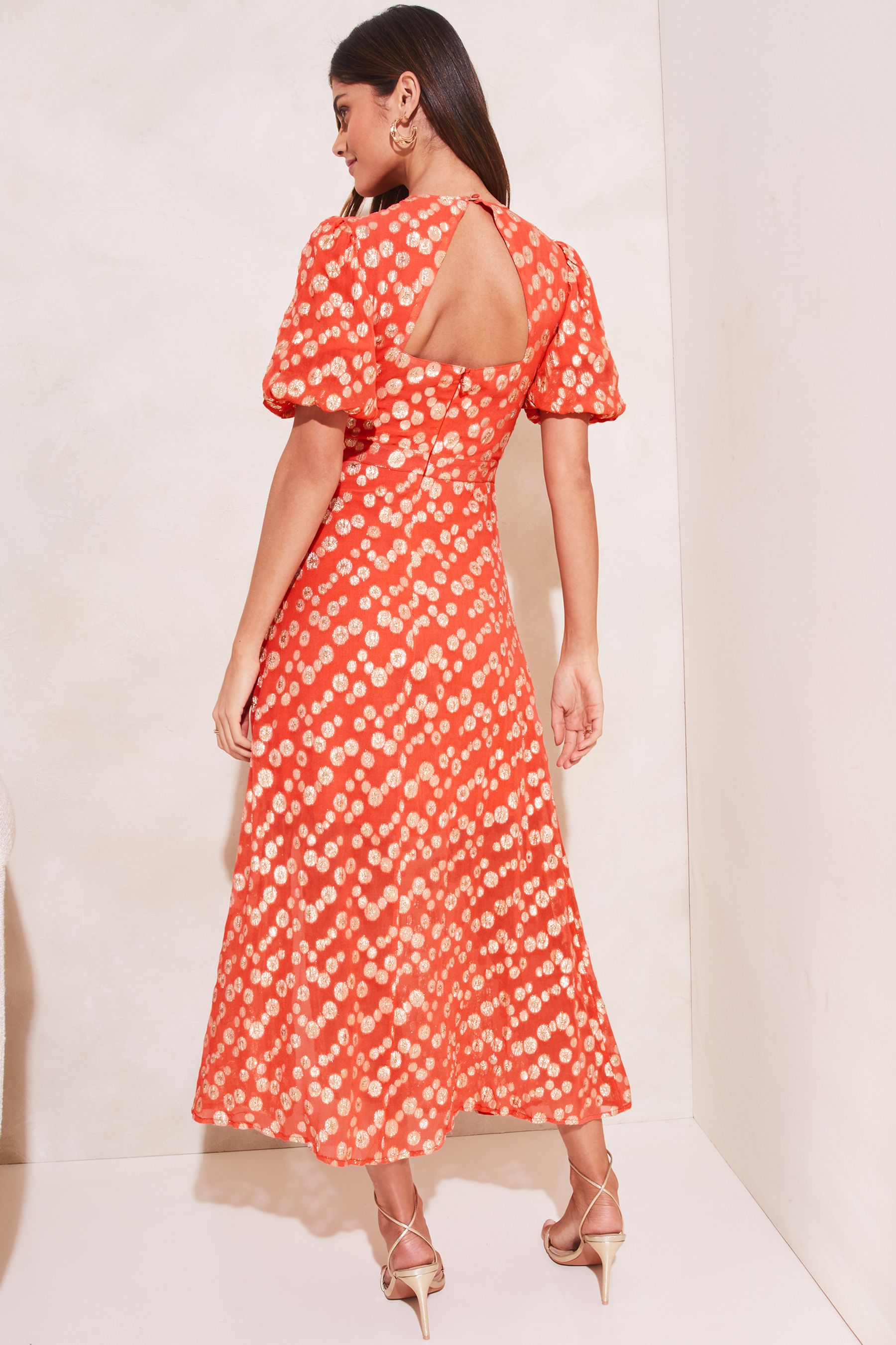 Buy Lipsy Peach Metallic Puff Sleeve Round Neck Split Midi Dress from Next Luxembourg