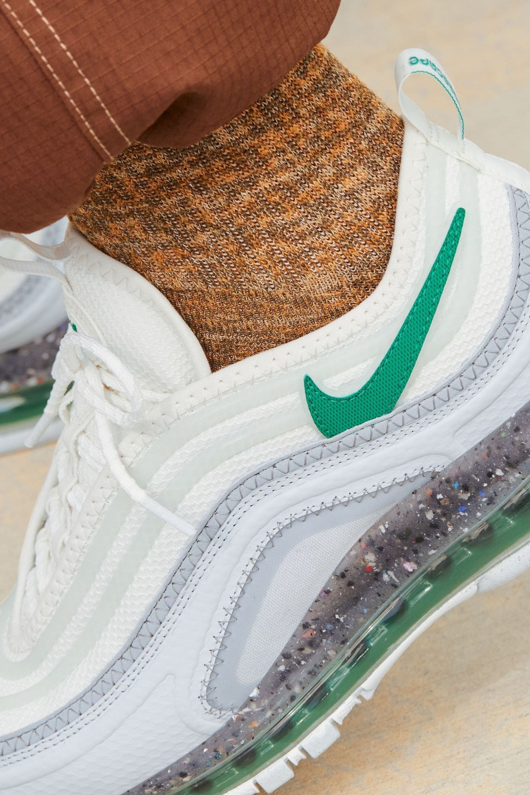 Womens nike 97s white top