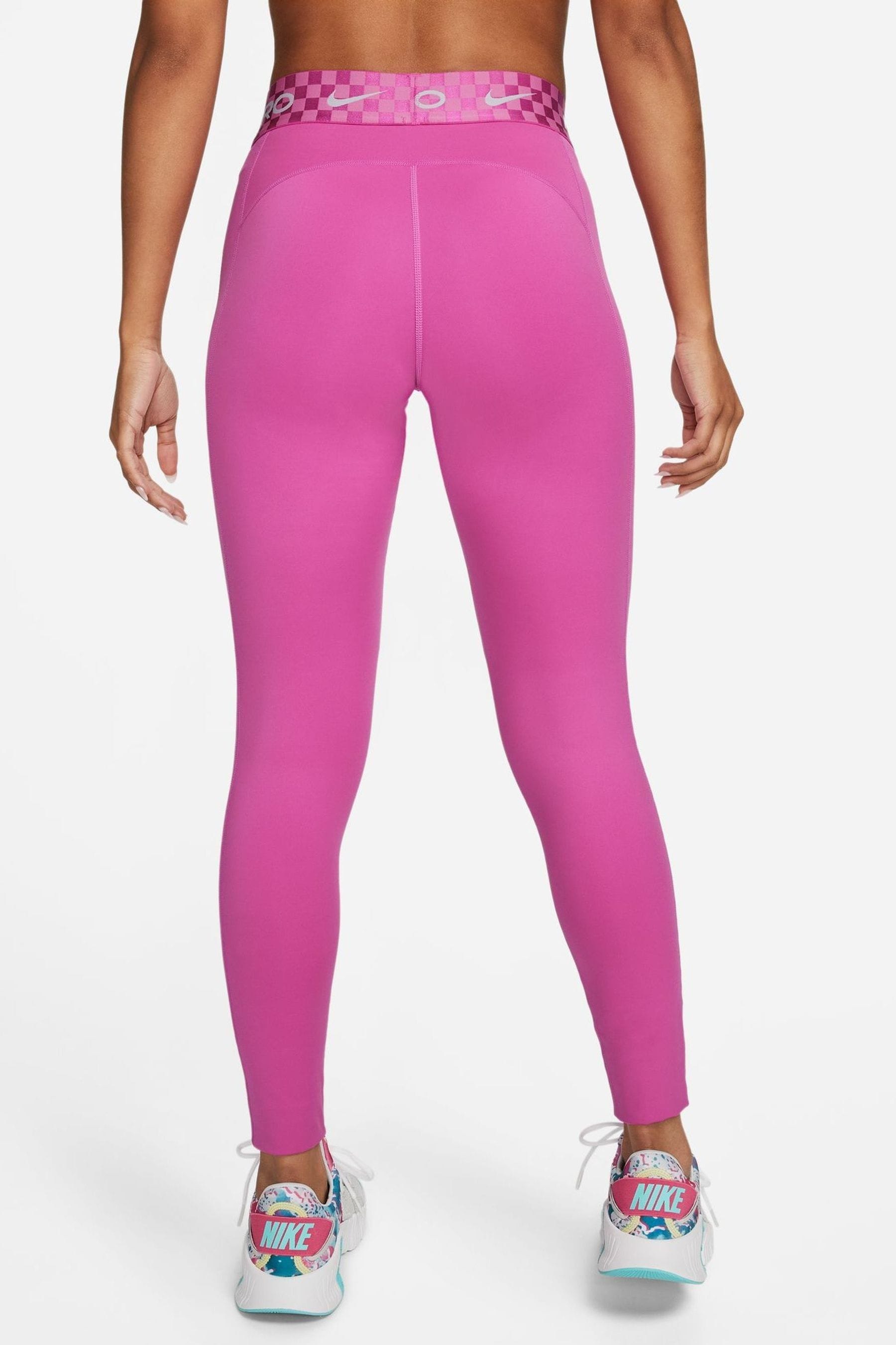 Buy Nike Pink Pro Graphic Full Length Training Leggings from Next Germany
