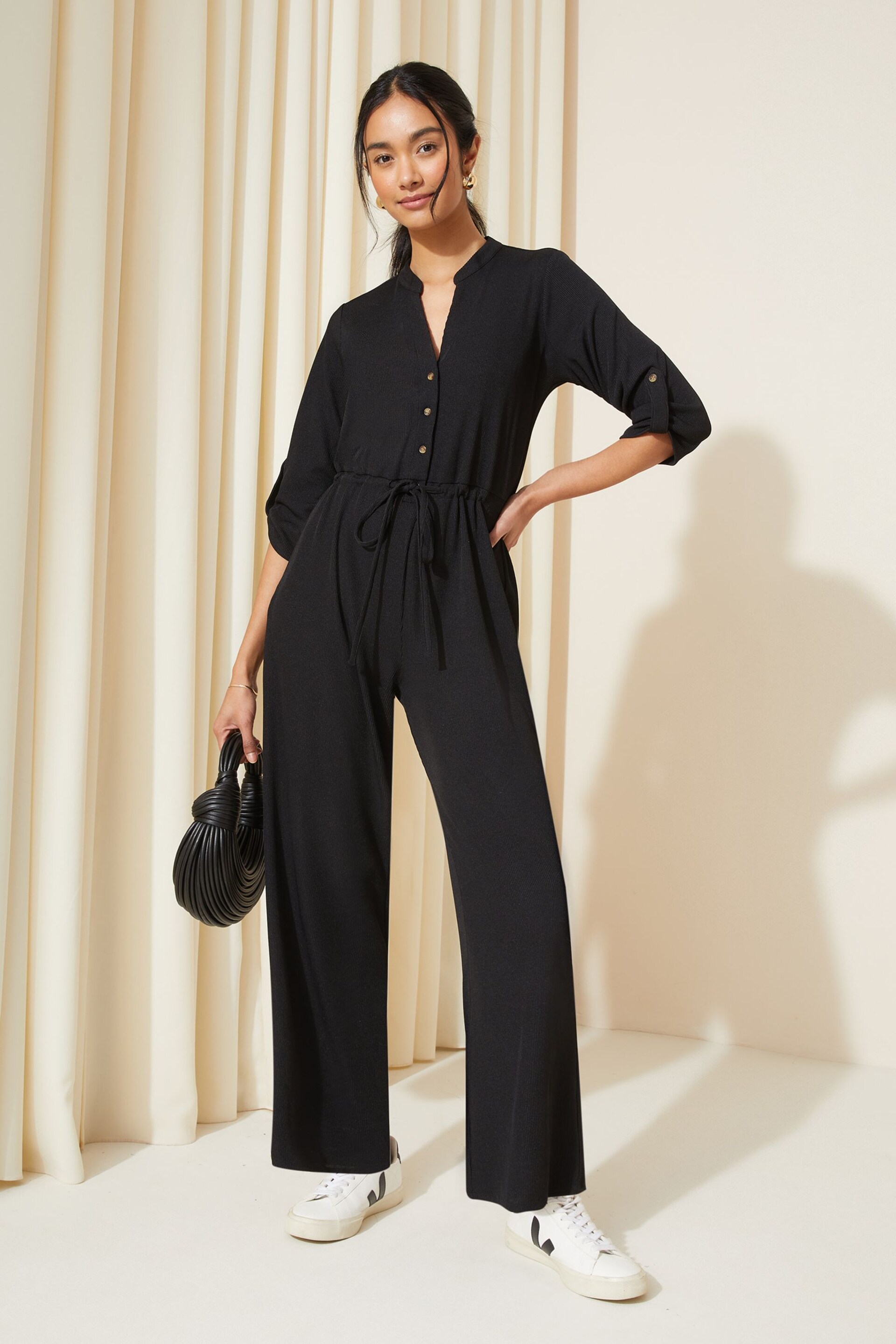 Friends Like These Black Jersey Long Sleeve Cinched Waist Jumpsuit - Image 1 of 4