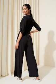 Friends Like These Black Jersey Long Sleeve Cinched Waist Jumpsuit - Image 4 of 4