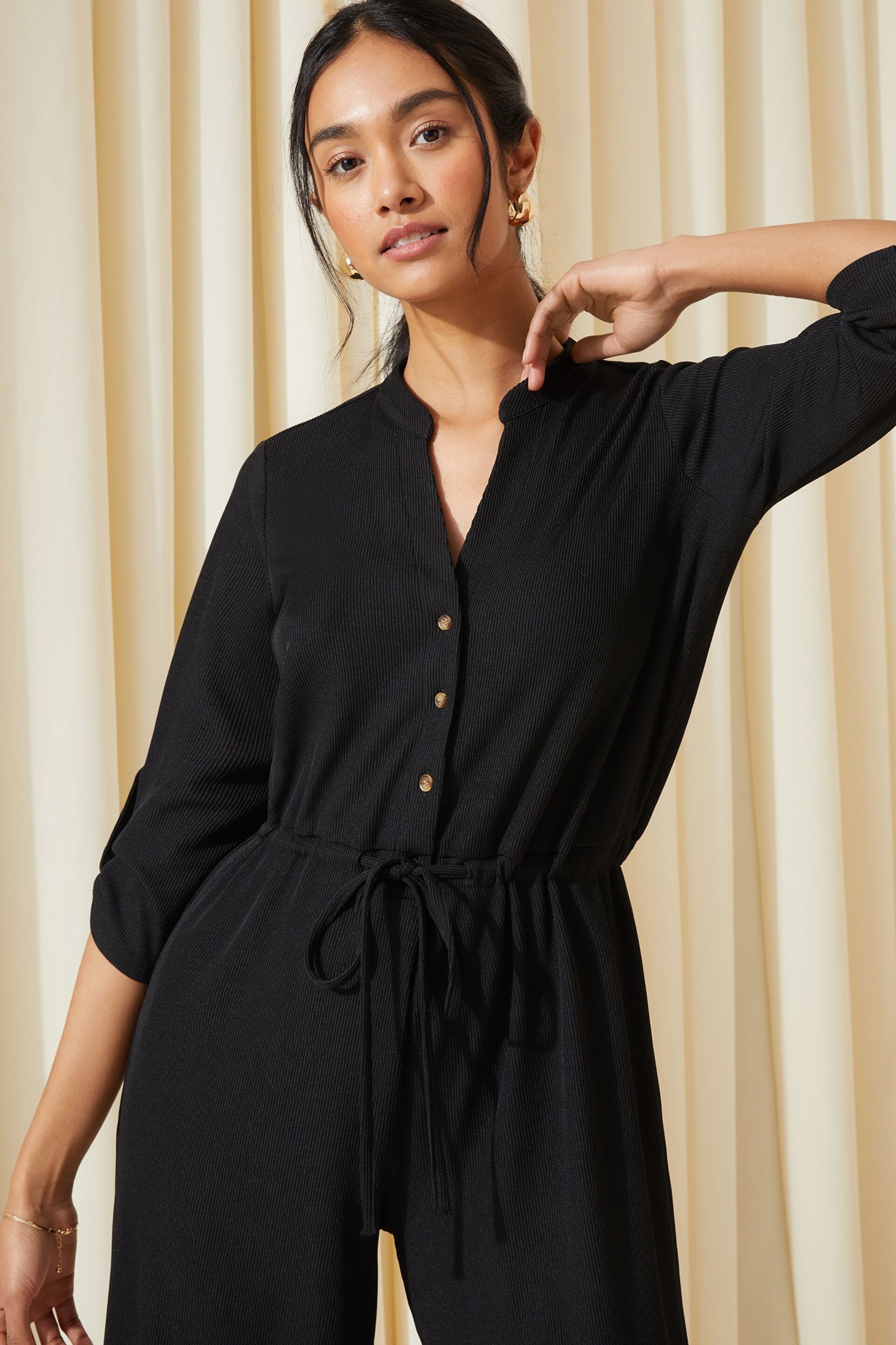 Friends Like These Black Petite Jersey Long Sleeve Cinched Waist Jumpsuit - Image 2 of 4