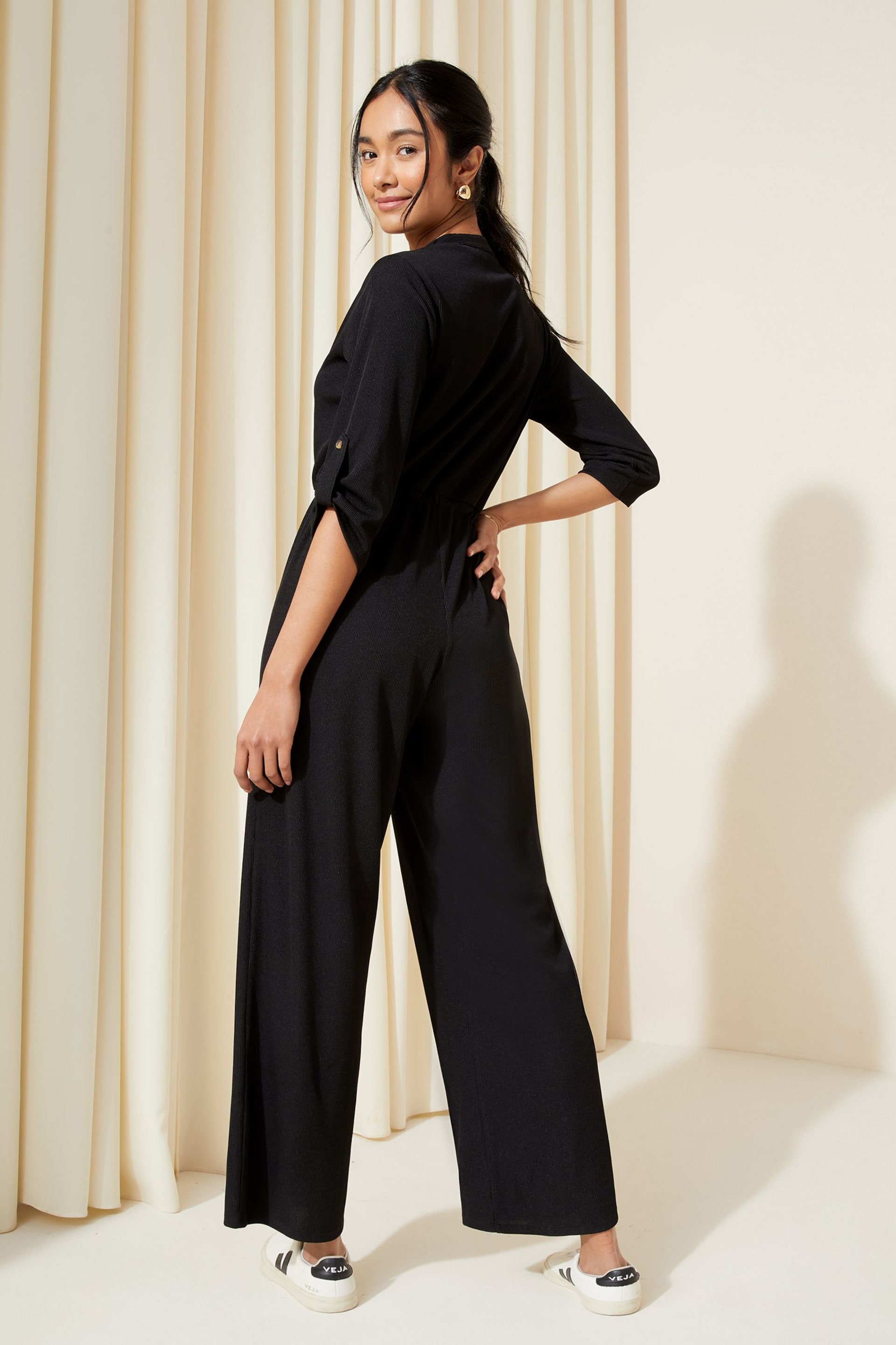 Friends Like These Black Petite Jersey Long Sleeve Cinched Waist Jumpsuit - Image 4 of 4