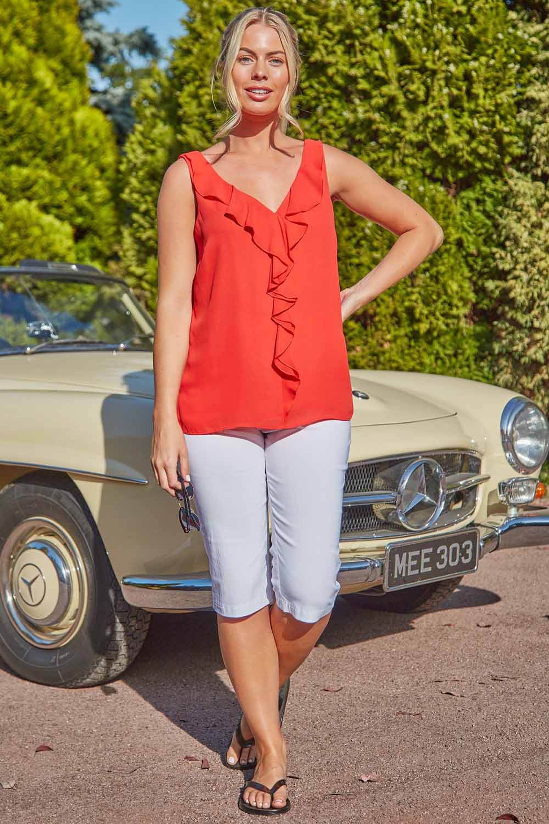 Ladies white knee length shorts uk shop