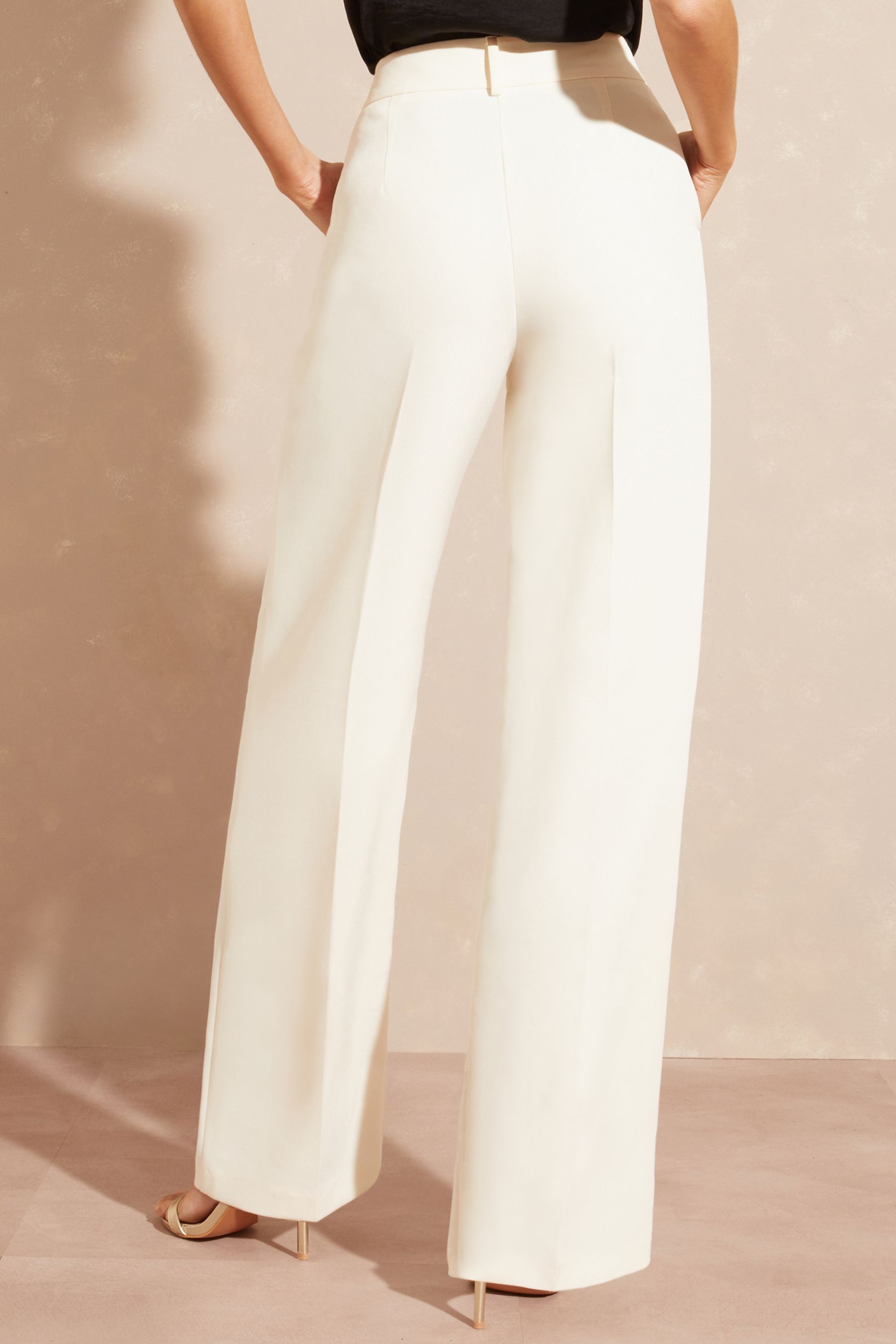 Ivory wide leg trousers hotsell