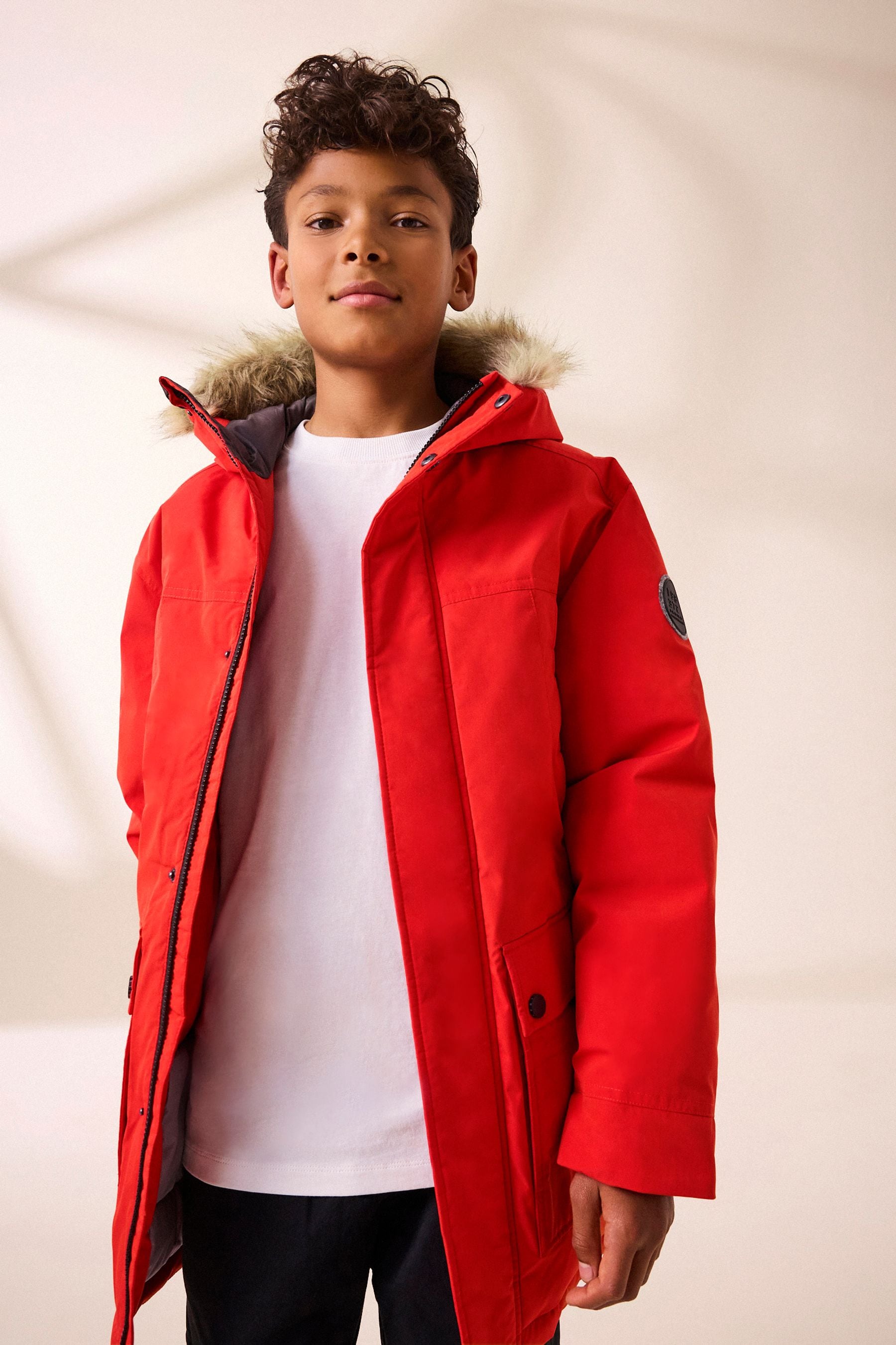 Buy Orange Faux Fur Trim Hooded Padded Parka Coat 3 16yrs from the Next UK online shop