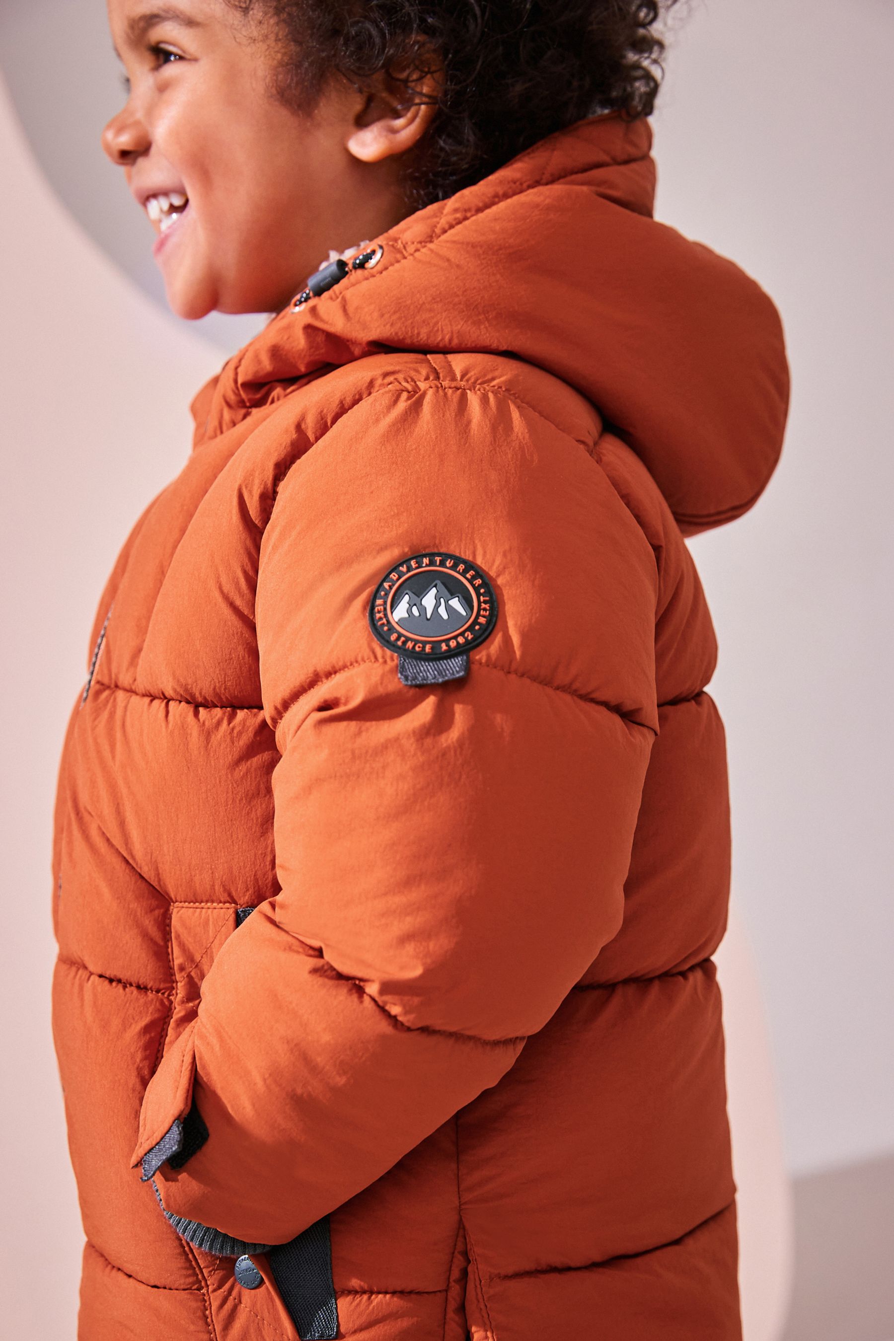 Rust borg coat store