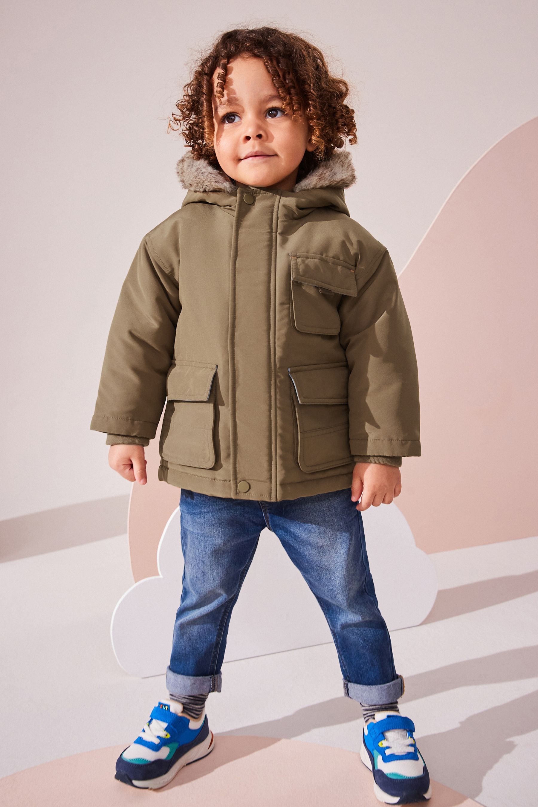 Furry hooded parka hotsell