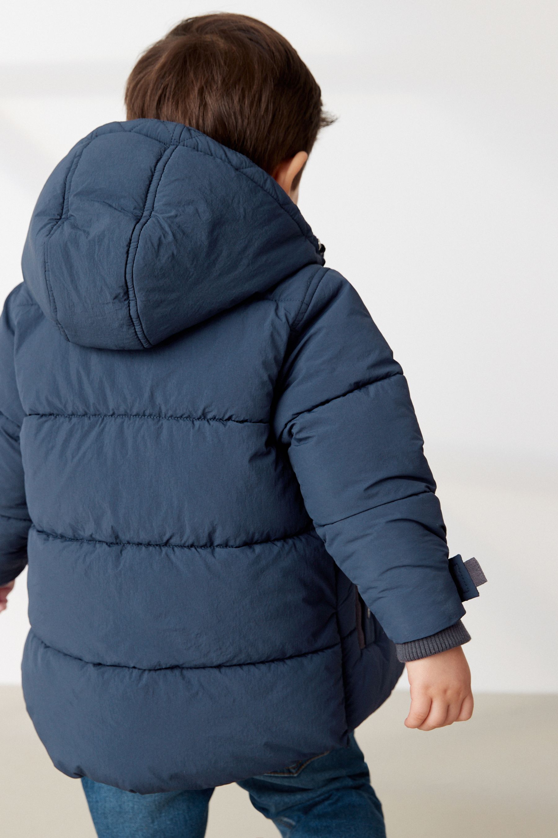 Buy Navy Borg Fleece Lined Shower Resistant Hooded Padded Coat 3mths 7yrs from the Next UK online shop