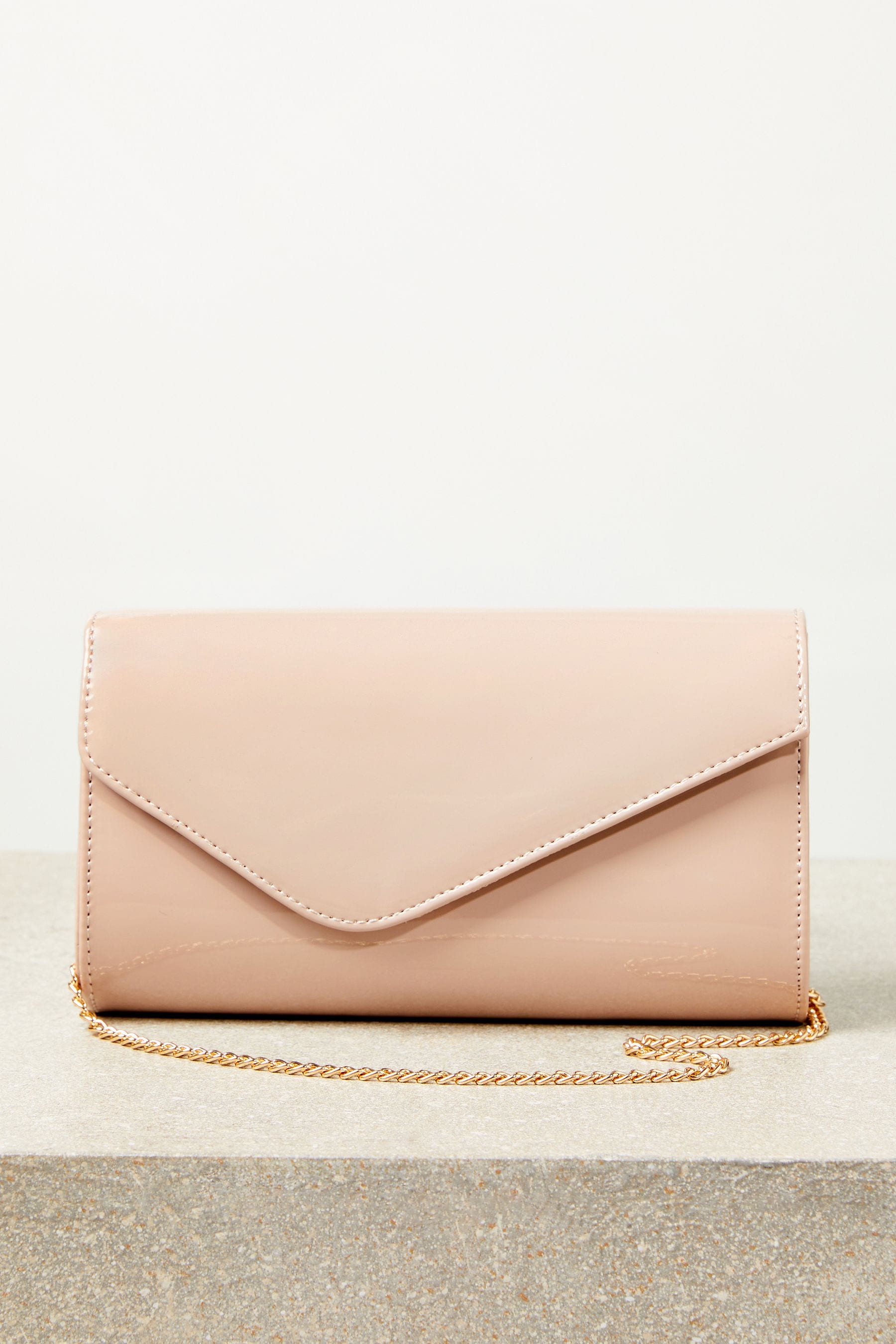 Buy Lipsy Nude Pink Asymmetric Foldover Chain Clutch Bag from the Next UK online shop