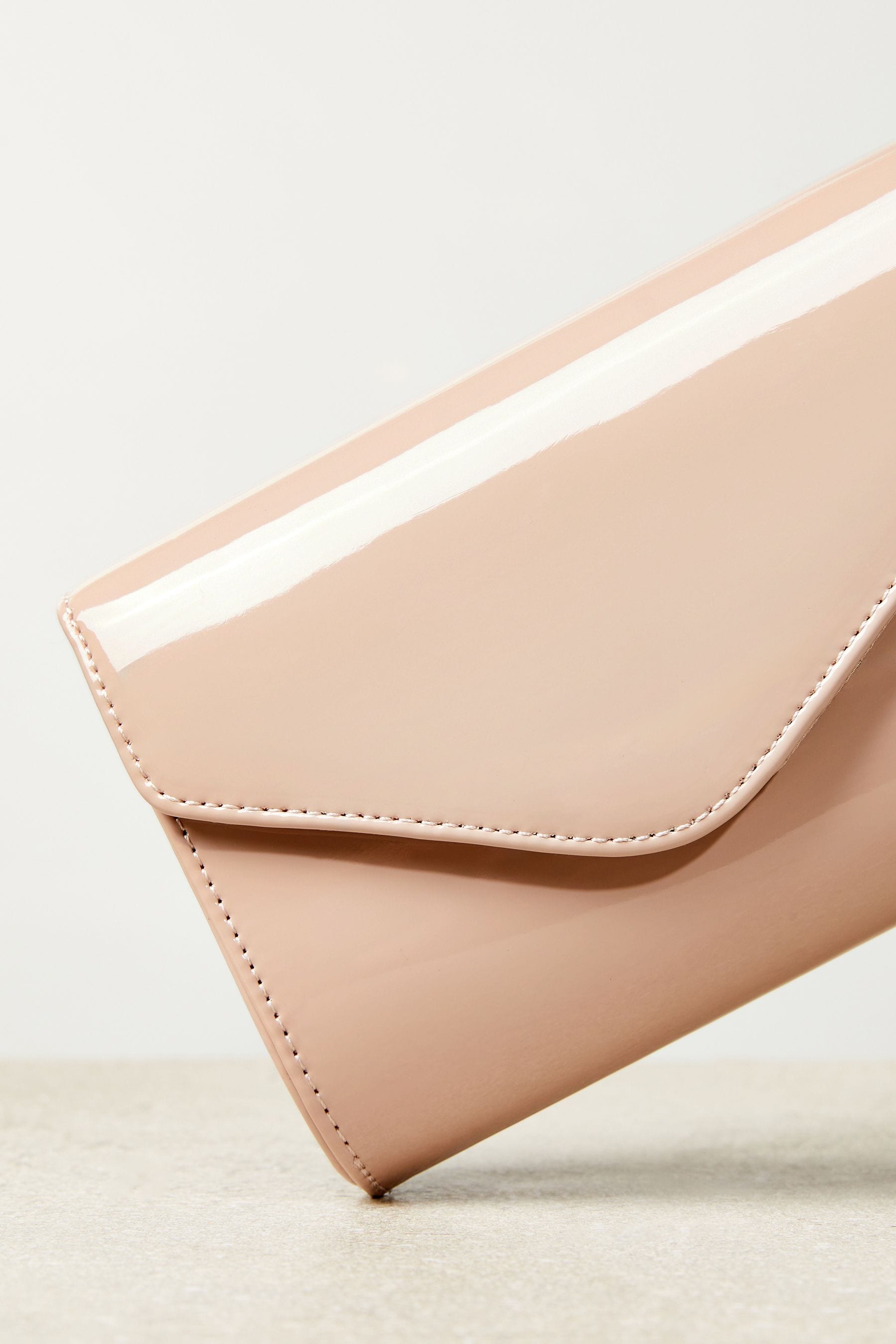Beige patent clutch bag store