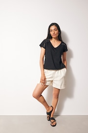 Black V-Neck Bubble Hem Top - Image 1 of 2