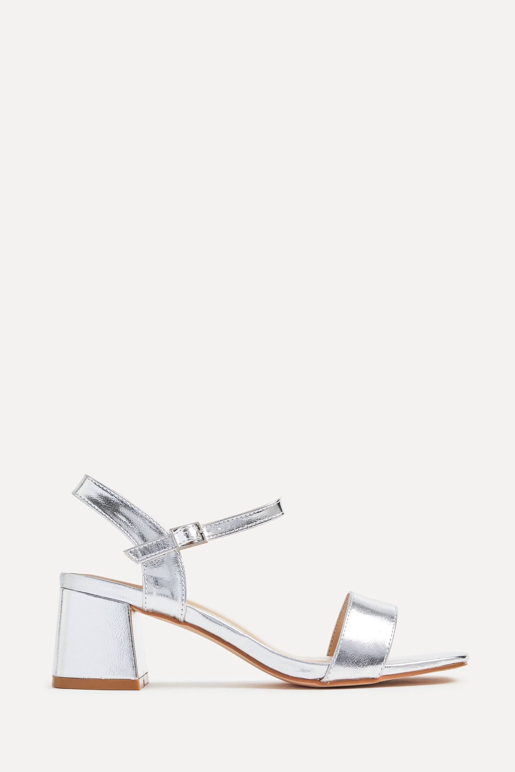 Barely there silver block heels best sale