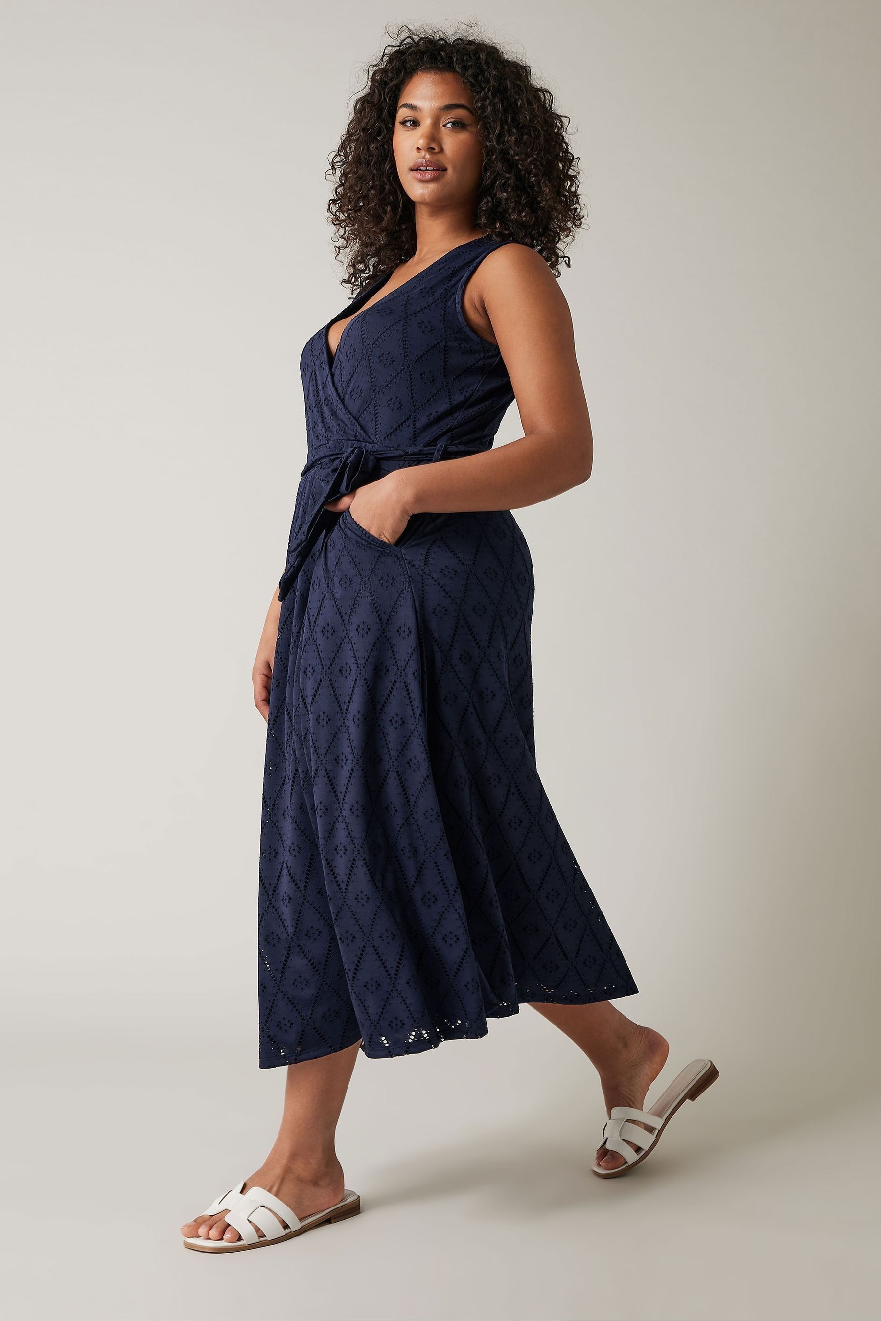 Buy Evans Sleeveless Broidery Wrap White Dress from Next Oman
