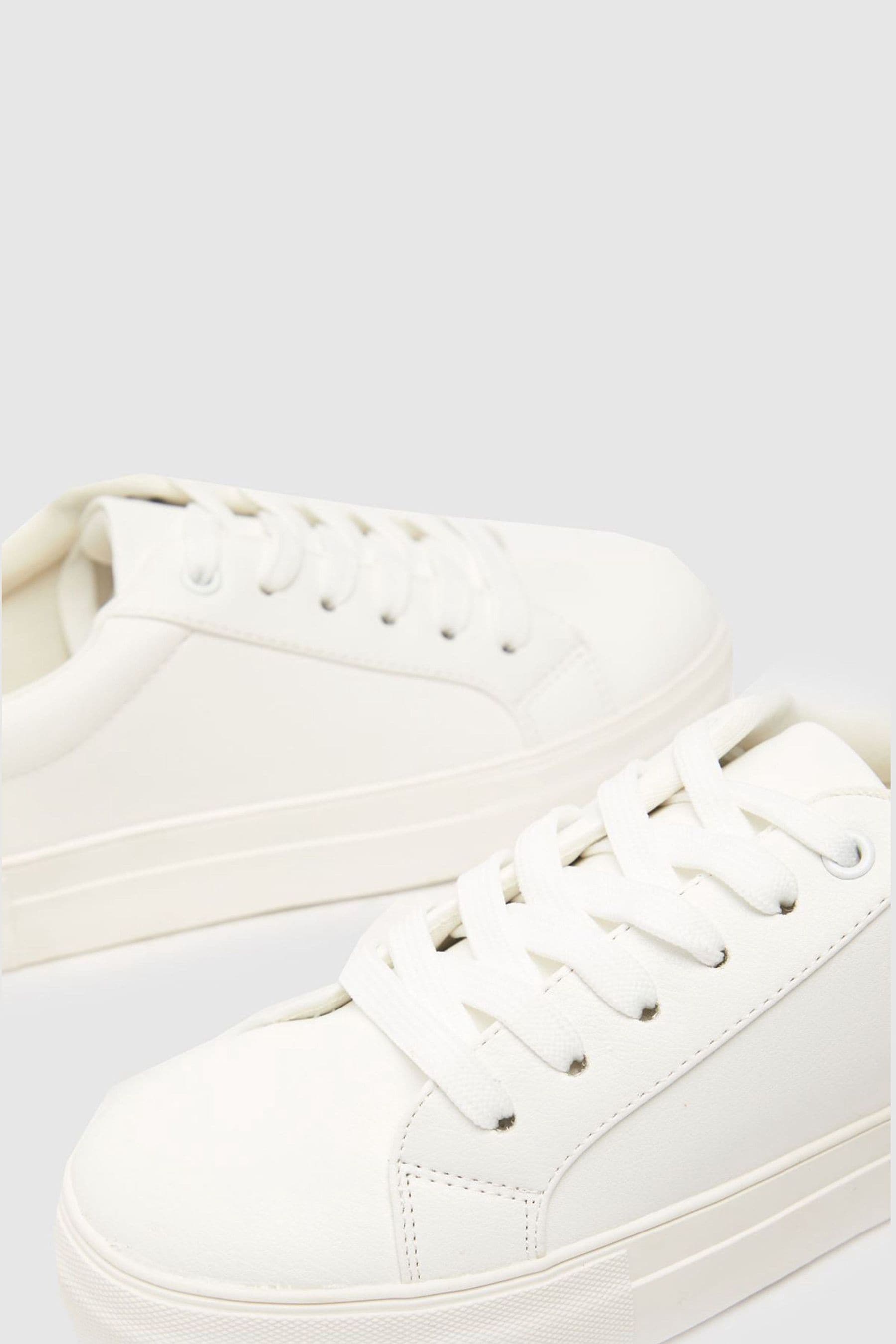 White trainers schuh store
