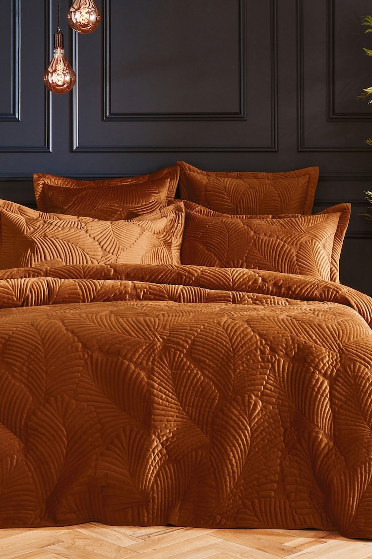 Paoletti Orange Palmeria Quilted Duvet Cover and Oxford Border Pillowcase Set - Image 1 of 4