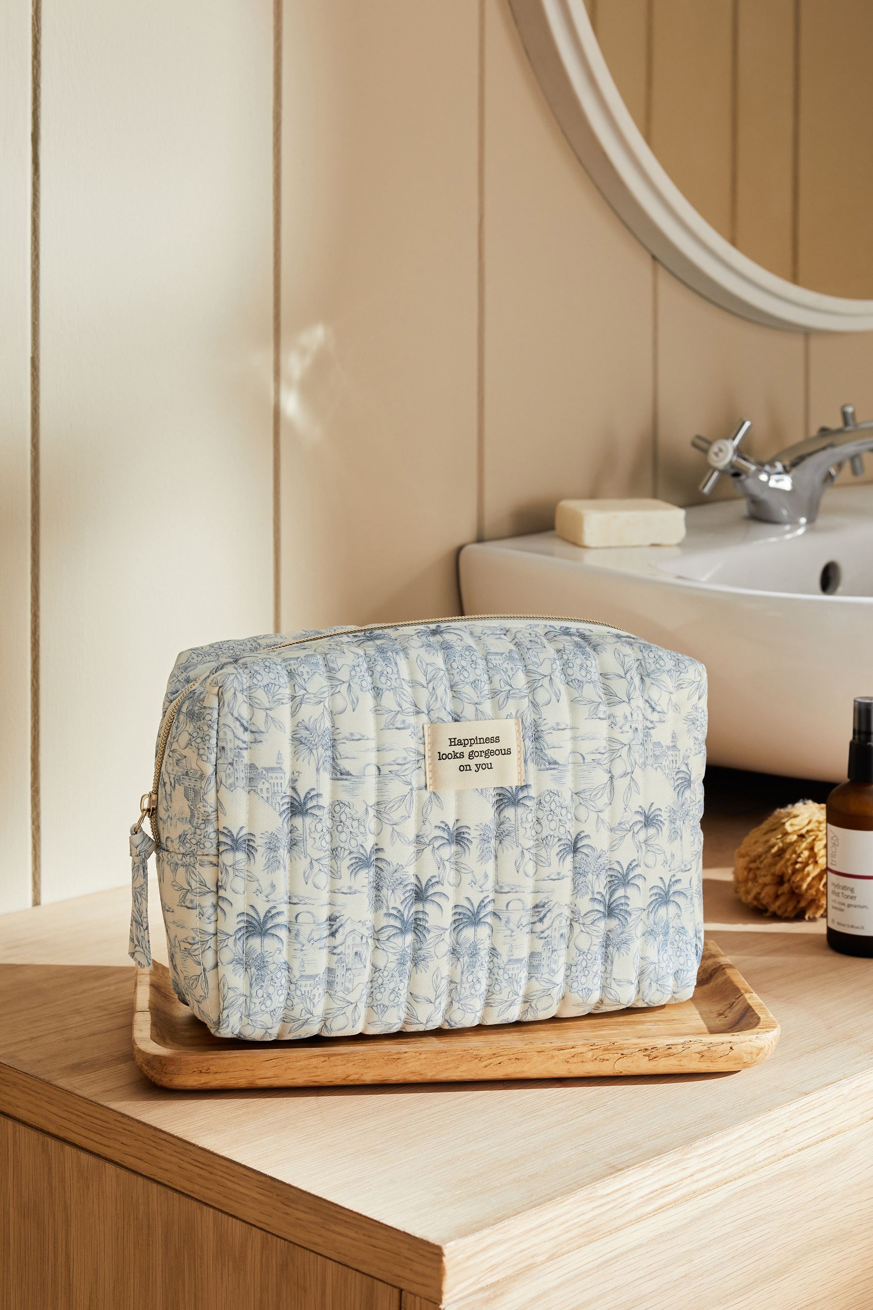 Buy Blue Tropical Print Quilted Makeup Bag from the Next UK online shop