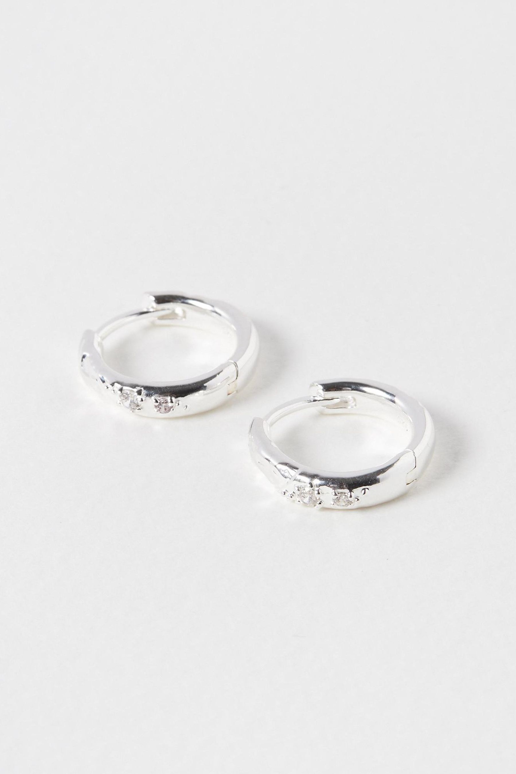 Buy Oliver Bonas Silver Tone Dervla Molten Texture Hoop Earrings from the Next UK online shop