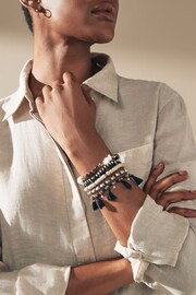 Black/White Tassel Bracelet Pack - Image 1 of 4