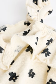 Cream/Black Floral Textured Strappy Baby Romper - Image 8 of 9