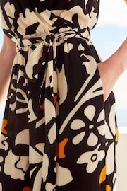 Monochrome Orange Floral V-Neck Belted Summer Wide Leg Jumpsuit - Image 4 of 6