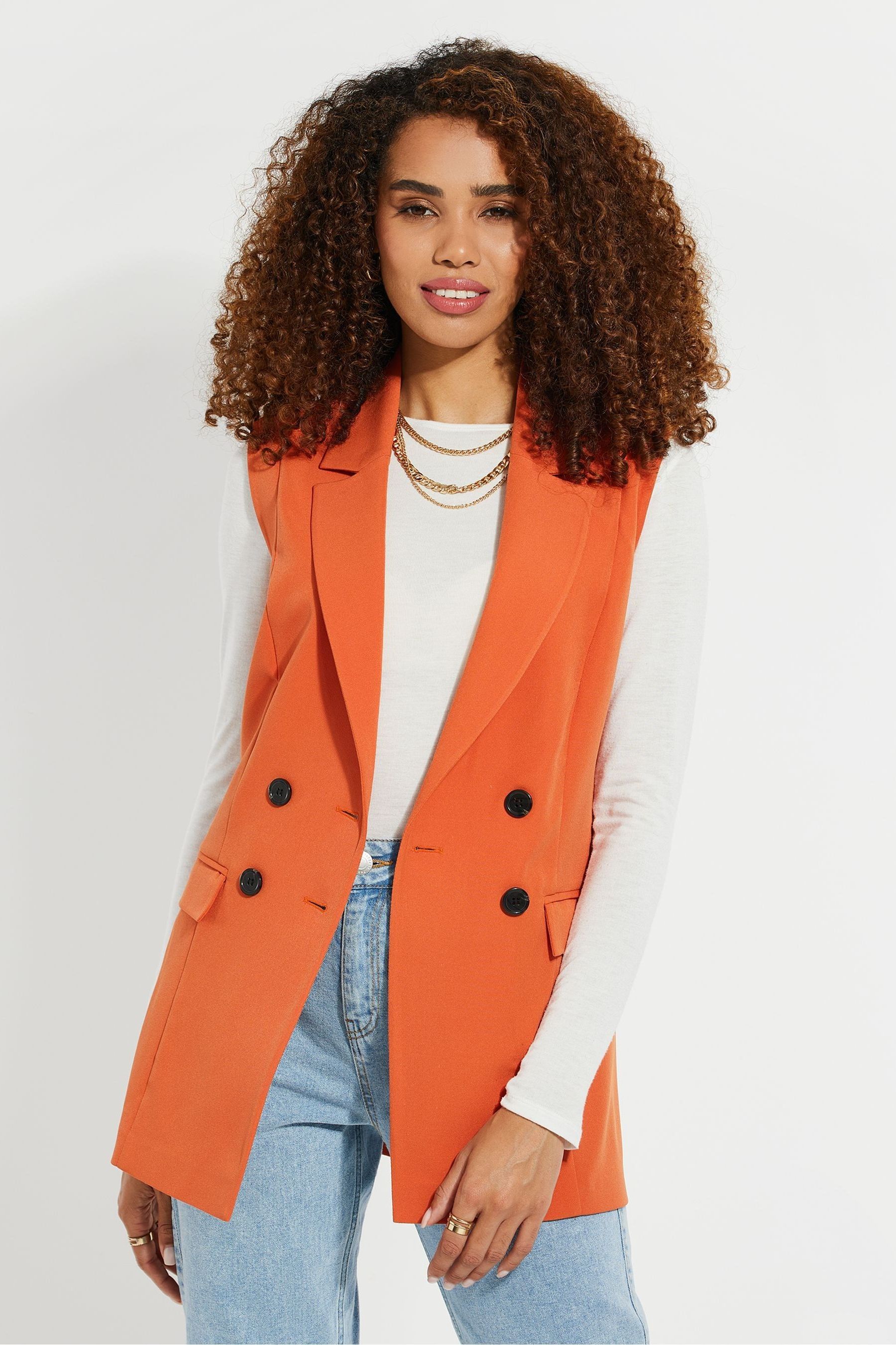 Buy Threadbare Orange Double Breasted Sleeveless Blazer from Next Oman