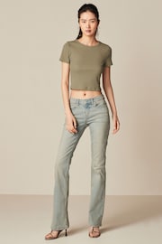 Green Tinted Low Bootcut Jeans - Image 1 of 7