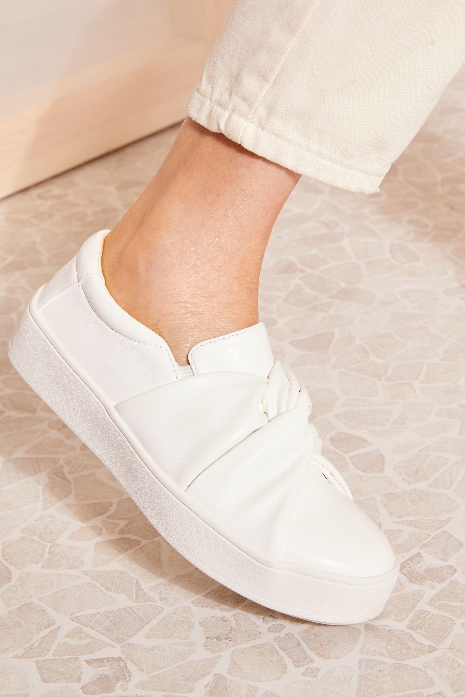 Buy Friends Like These White Faux Leather Knot Flatform Slip On Trainers from Next Luxembourg