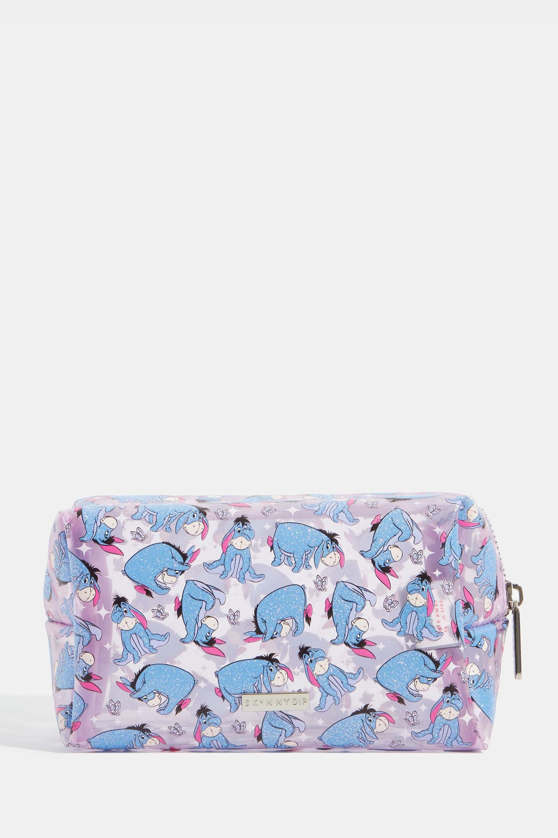 Buy Skinnydip Purple Skinnydip Purple Disney Eeyore Makeup Bag from Next Ireland