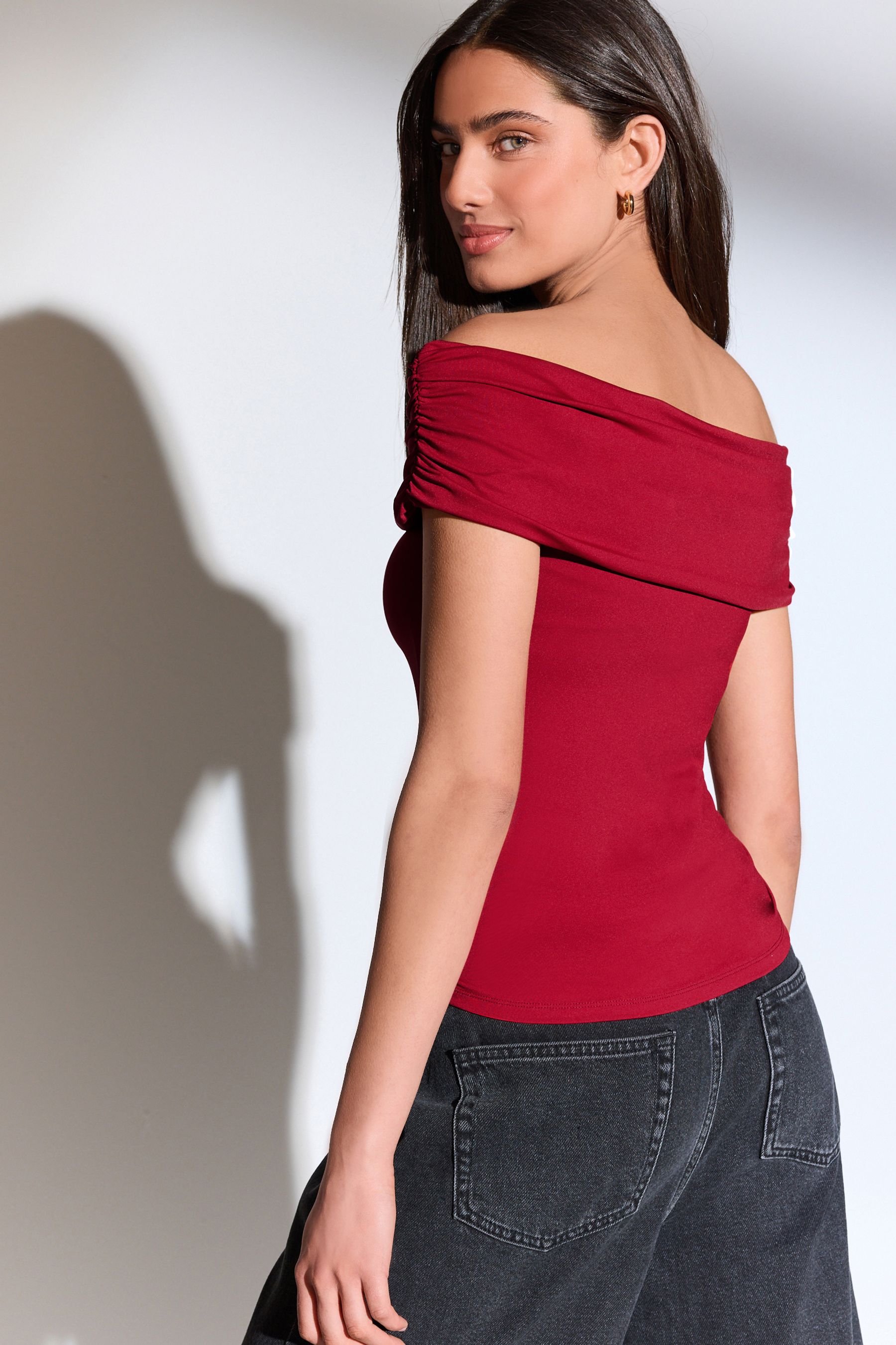 Buy Red Off The Shoulder Gathered Ruched Soft Touch Top from the Next UK online shop