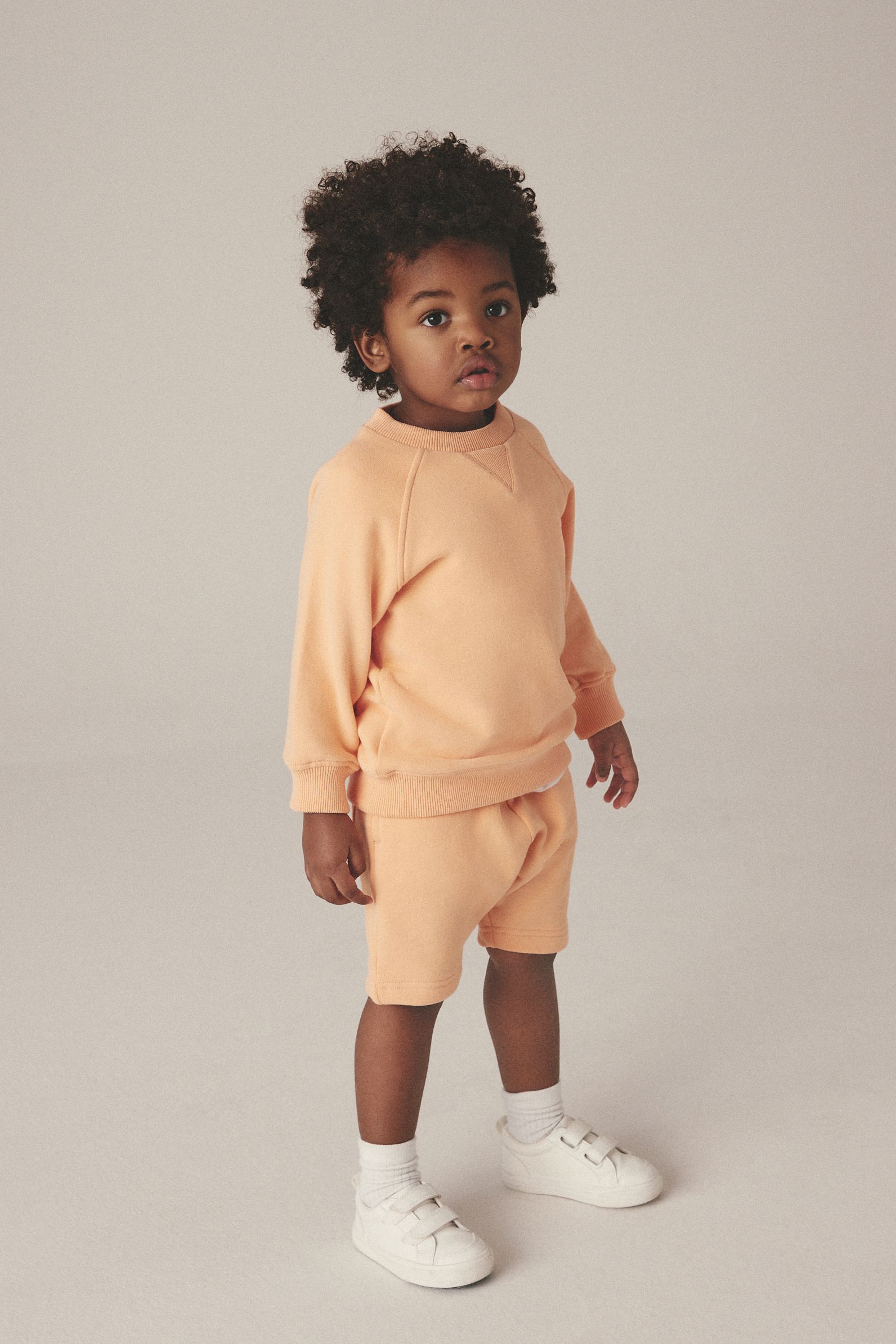 Light orange sweatshirt discount