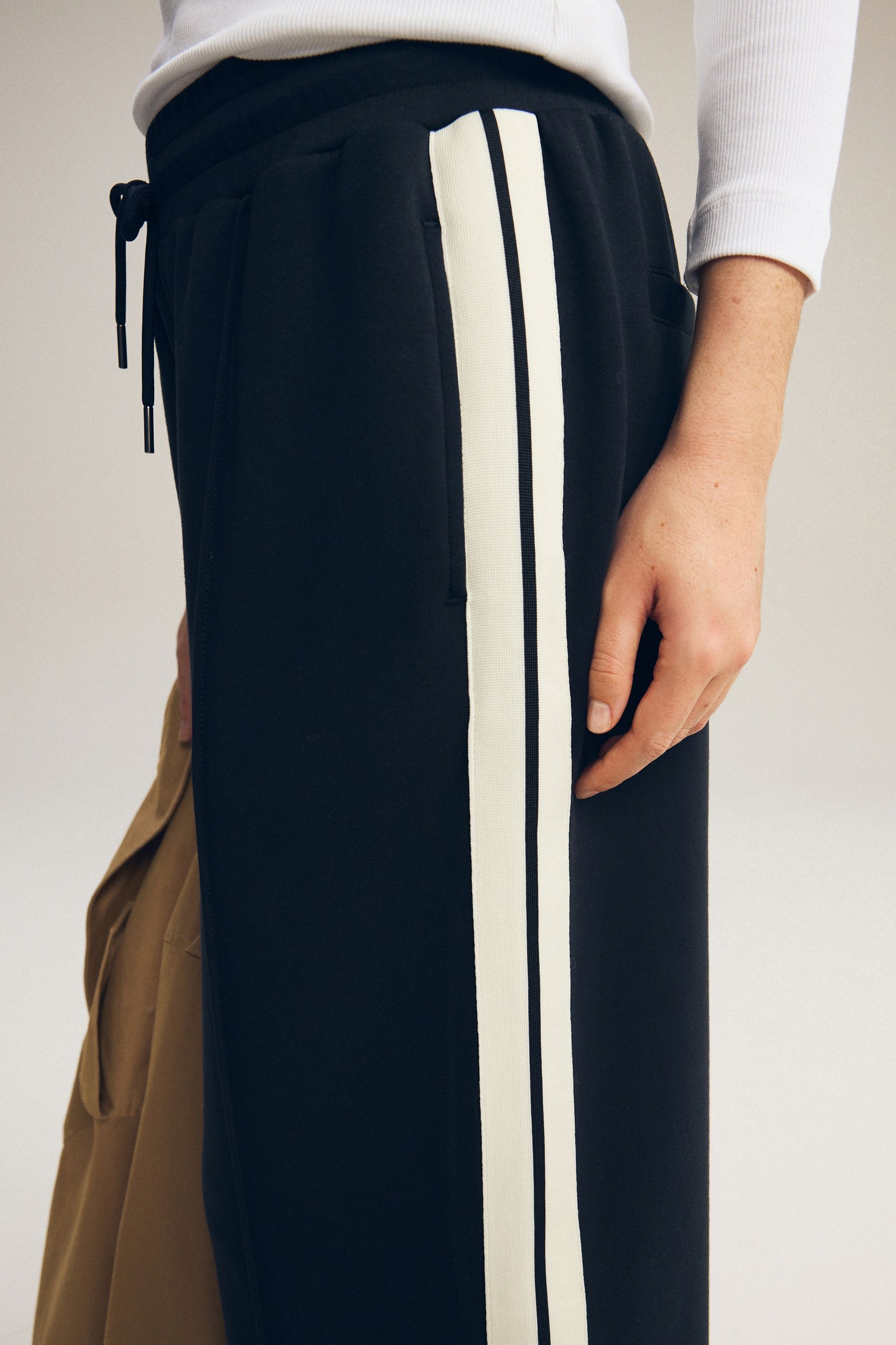 Buy Black Slinky Wide Leg Co ord Side Stripe Track Trousers from the Next UK online shop