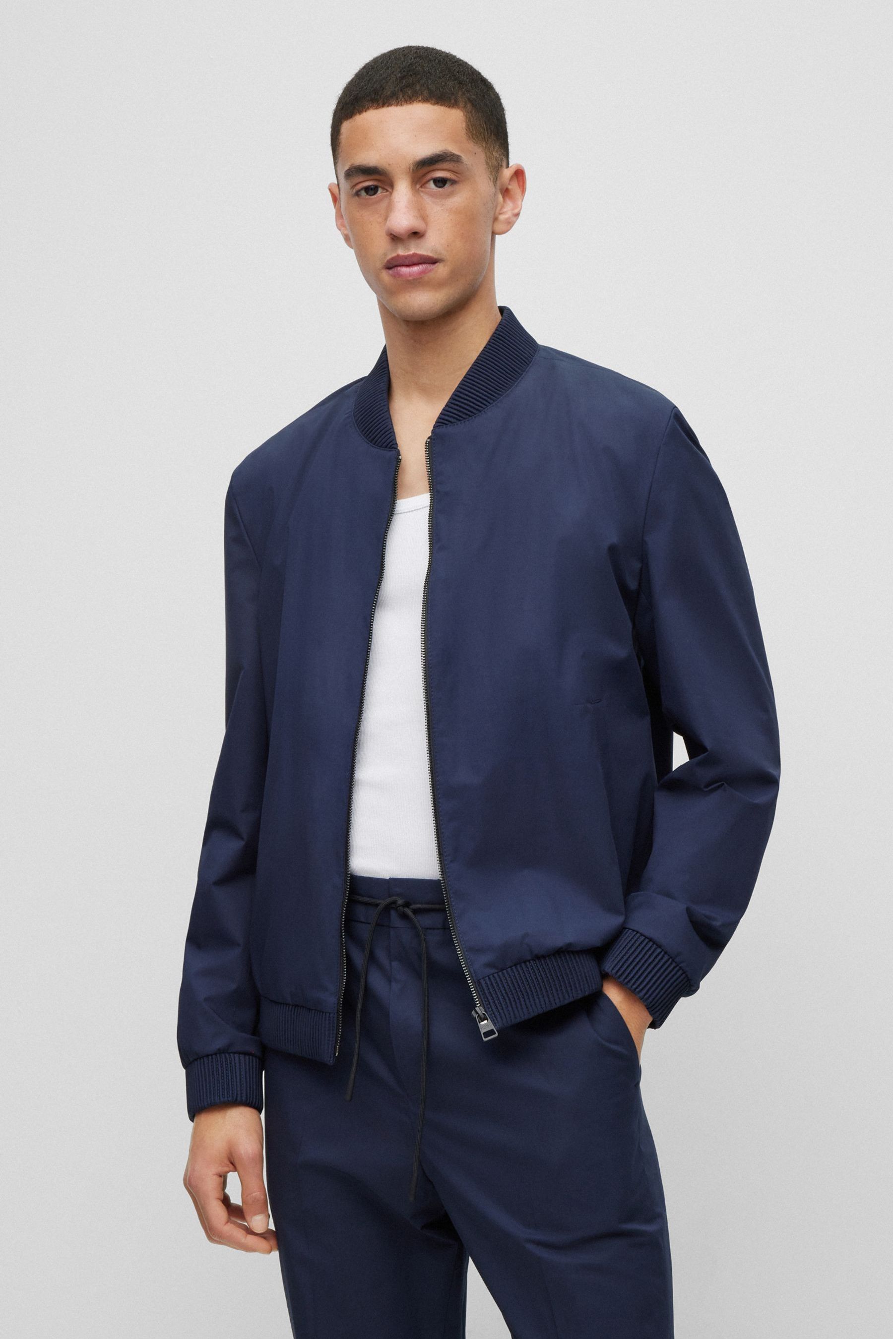 What to wear with a blue bomber jacket top