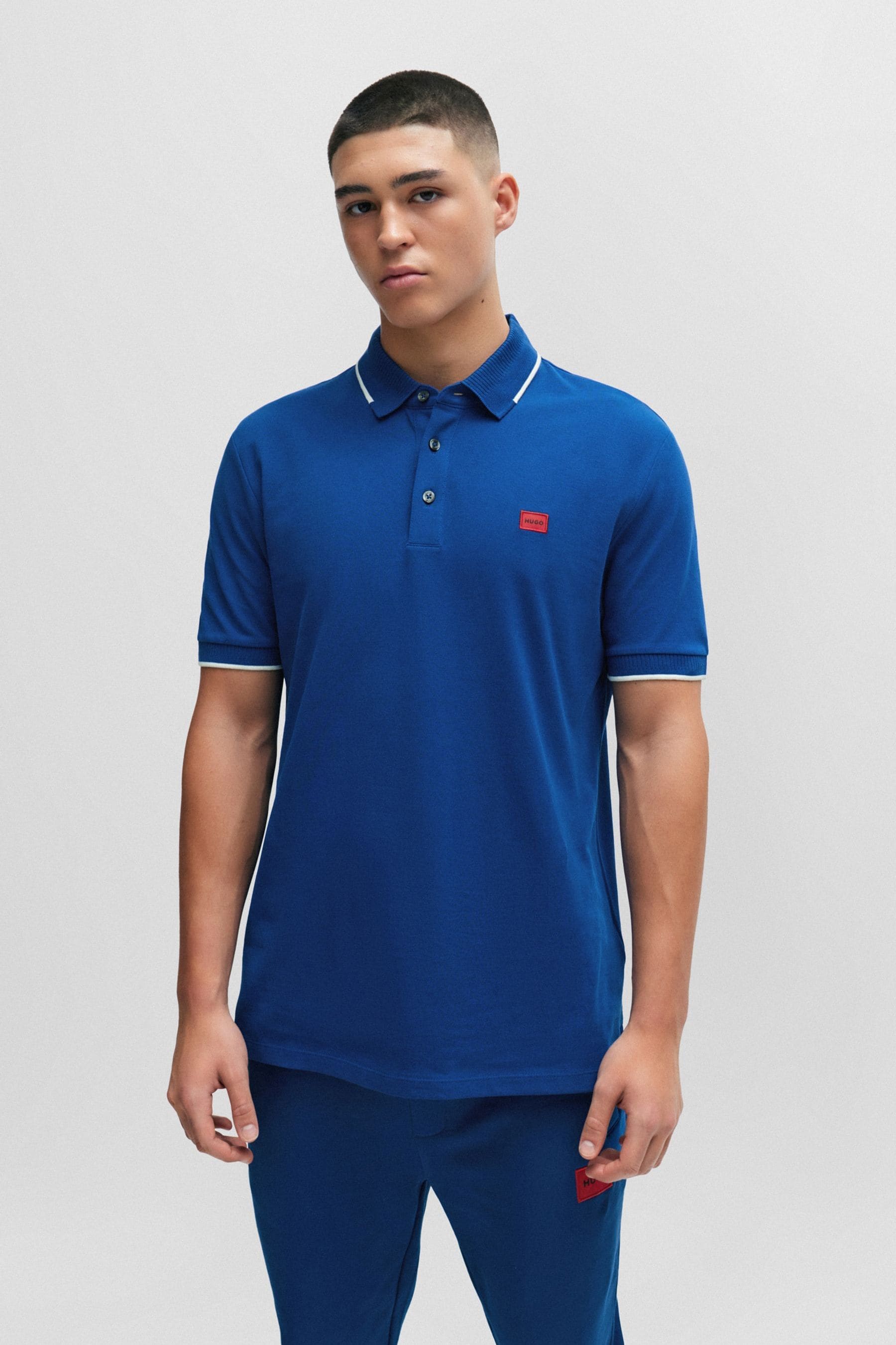 Buy HUGO Blue Cotton Pique Logo Label Slim Fit Polo Shirt from Next Luxembourg